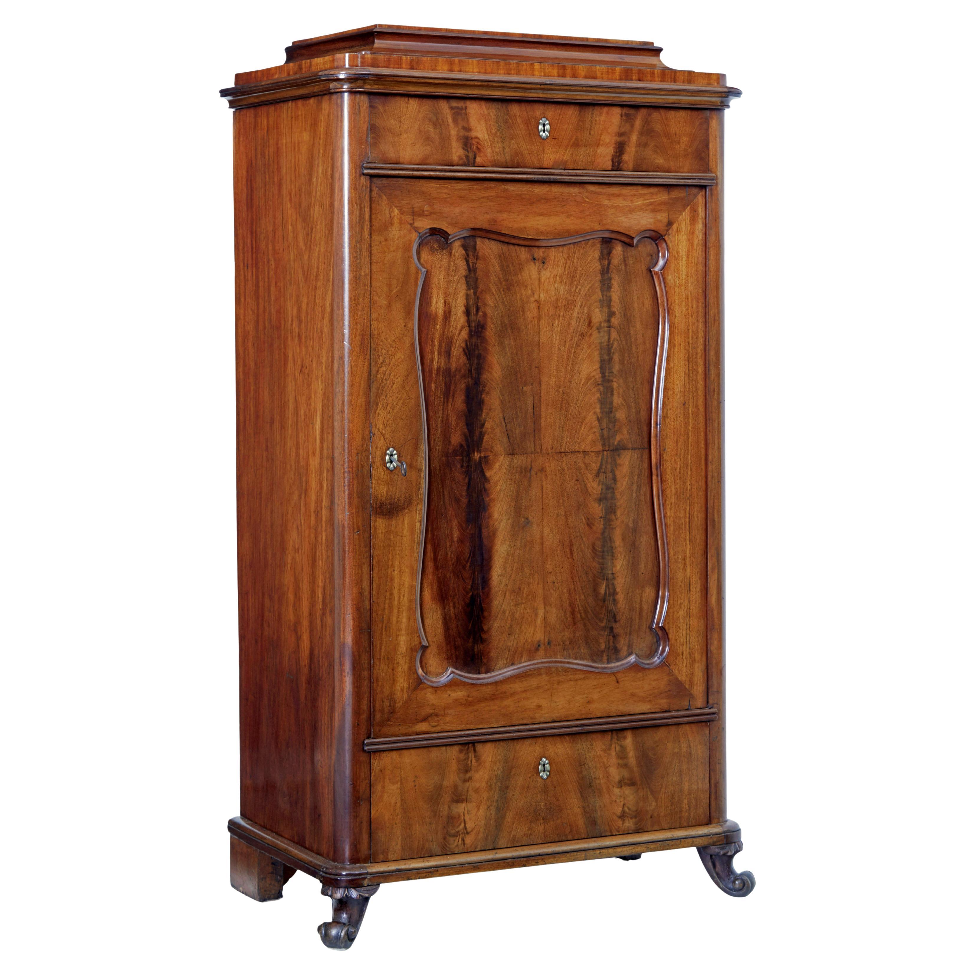 Mid 19th century Swedish flame mahogany cupboard For Sale