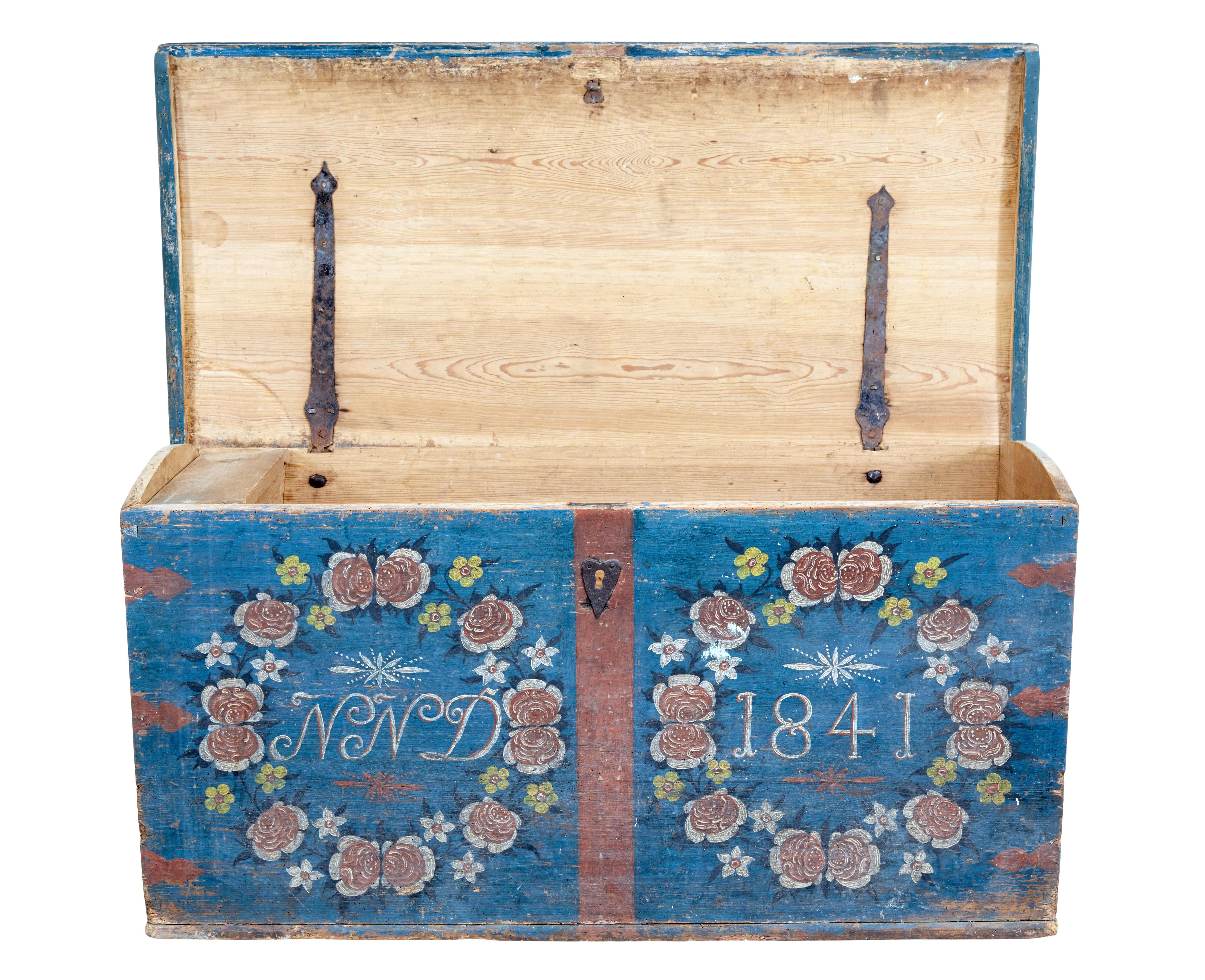 Mid 19th century Swedish folk art hand painted pine coffer circa 1841.

Fine quality piece of Scandinavian folk art.  Made from solid pine with a slight dome top lid.  Base coated in a blue/green scheme with initialed front and dated 1841.  Original