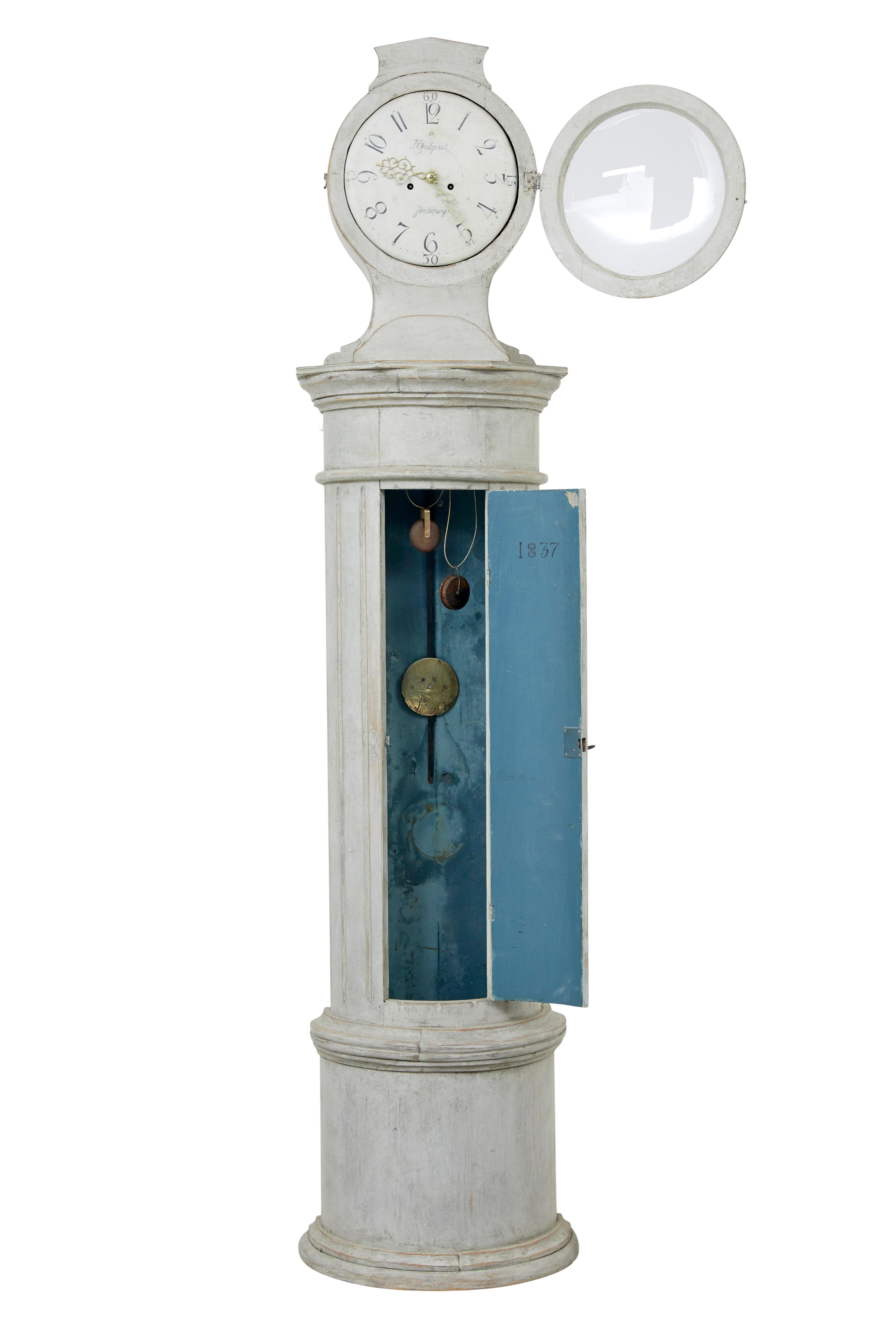 Mid 19th century Swedish decorative column long case clock circa 1837.

Beautiful long case clock from Sweden. Made with a decorative fluted column which forms a demi lune shape. Clock face with arabic numerals and signed by maker from the Jonkoping