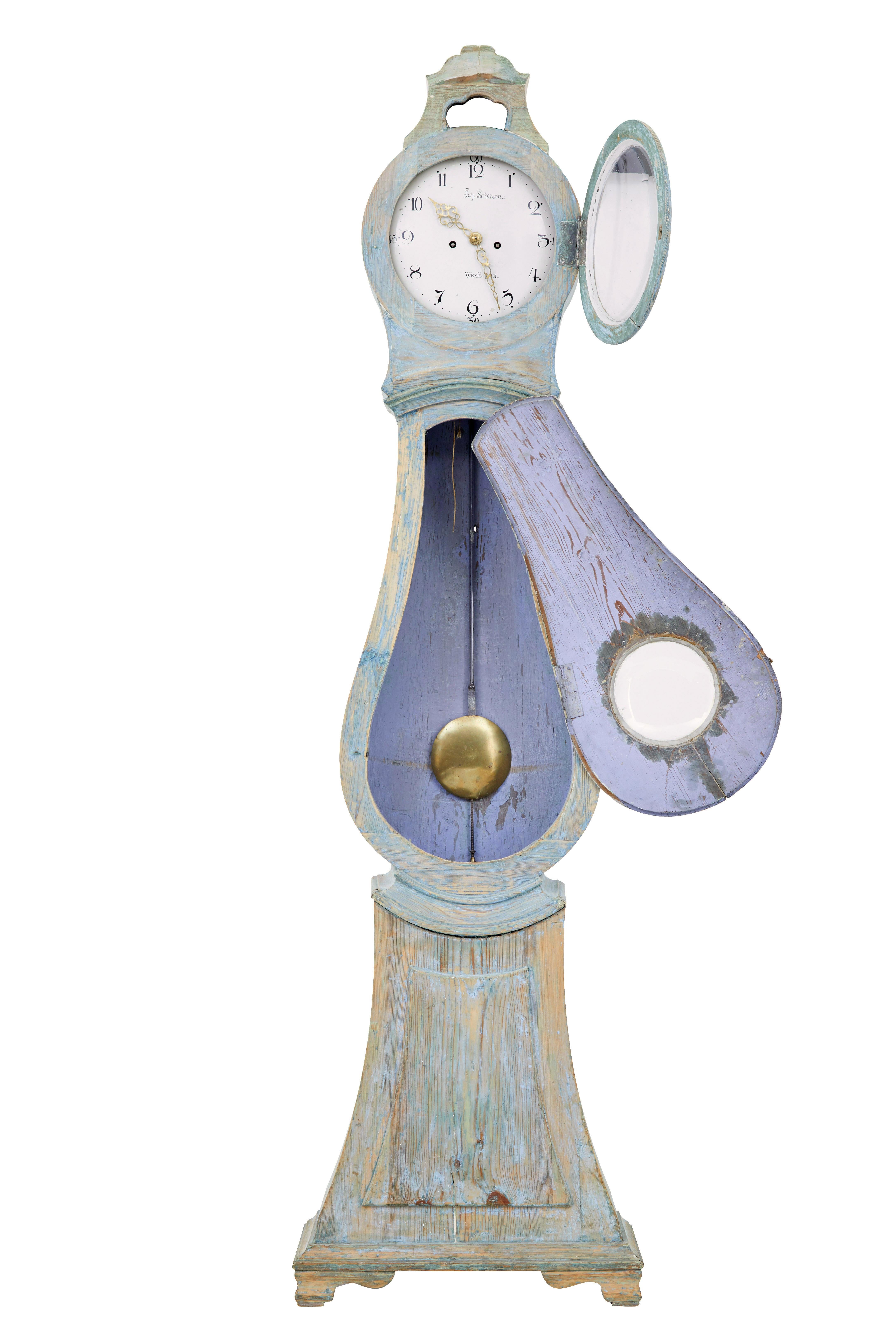 Mid 19th century Swedish pine long case mora clock circa 1850.

Large Swedish long case mora clock, presented in scraped back paint.

Scraped back down to reveal a partial colour of it's original paint.  Typical with these types of clocks is that