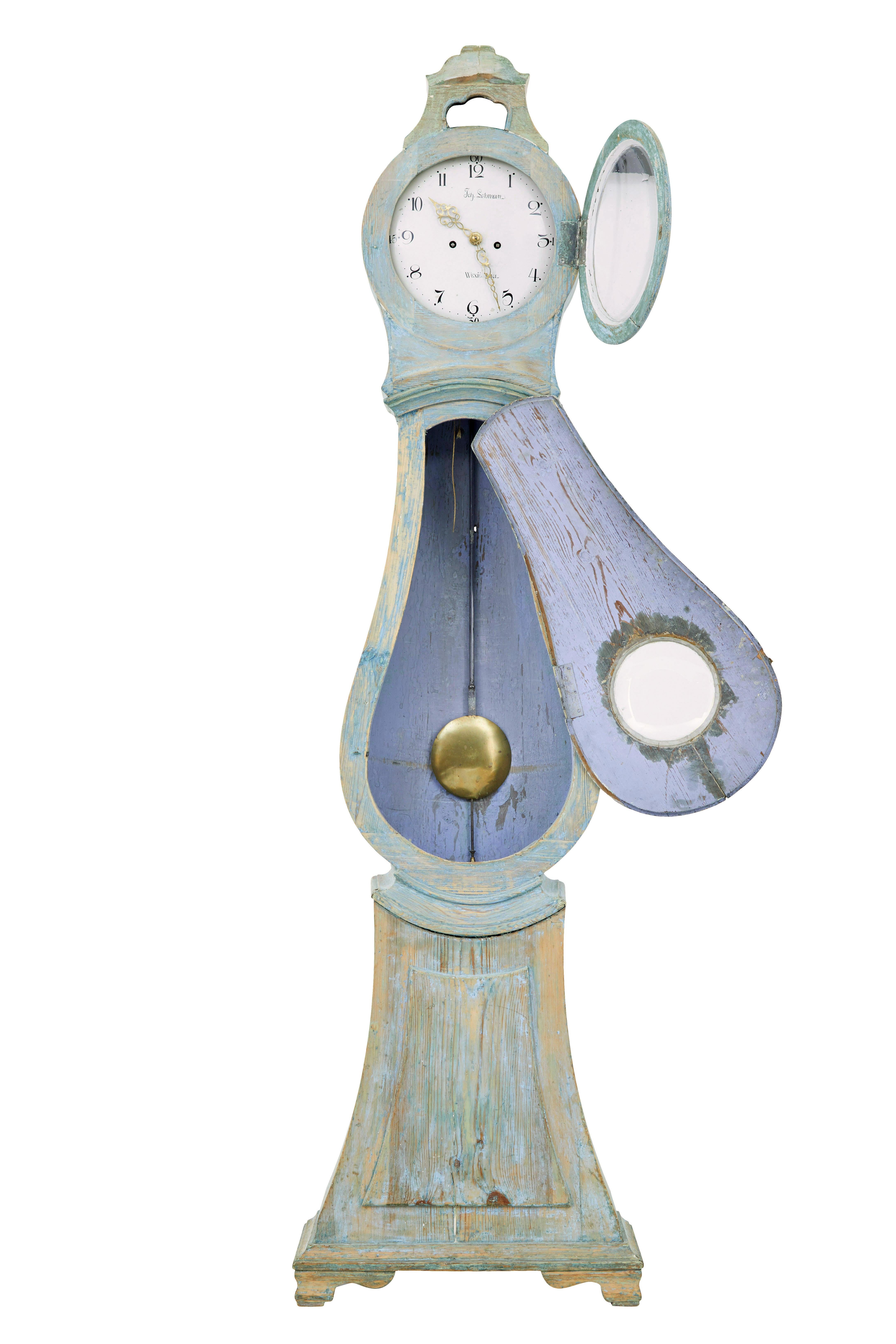Mid 19th century Swedish pine long case mora clock circa 1850.

Large Swedish long case mora clock, presented in scraped back paint.

Scraped back down to reveal a partial colour of it's original paint.  Typical with these types of clocks is that