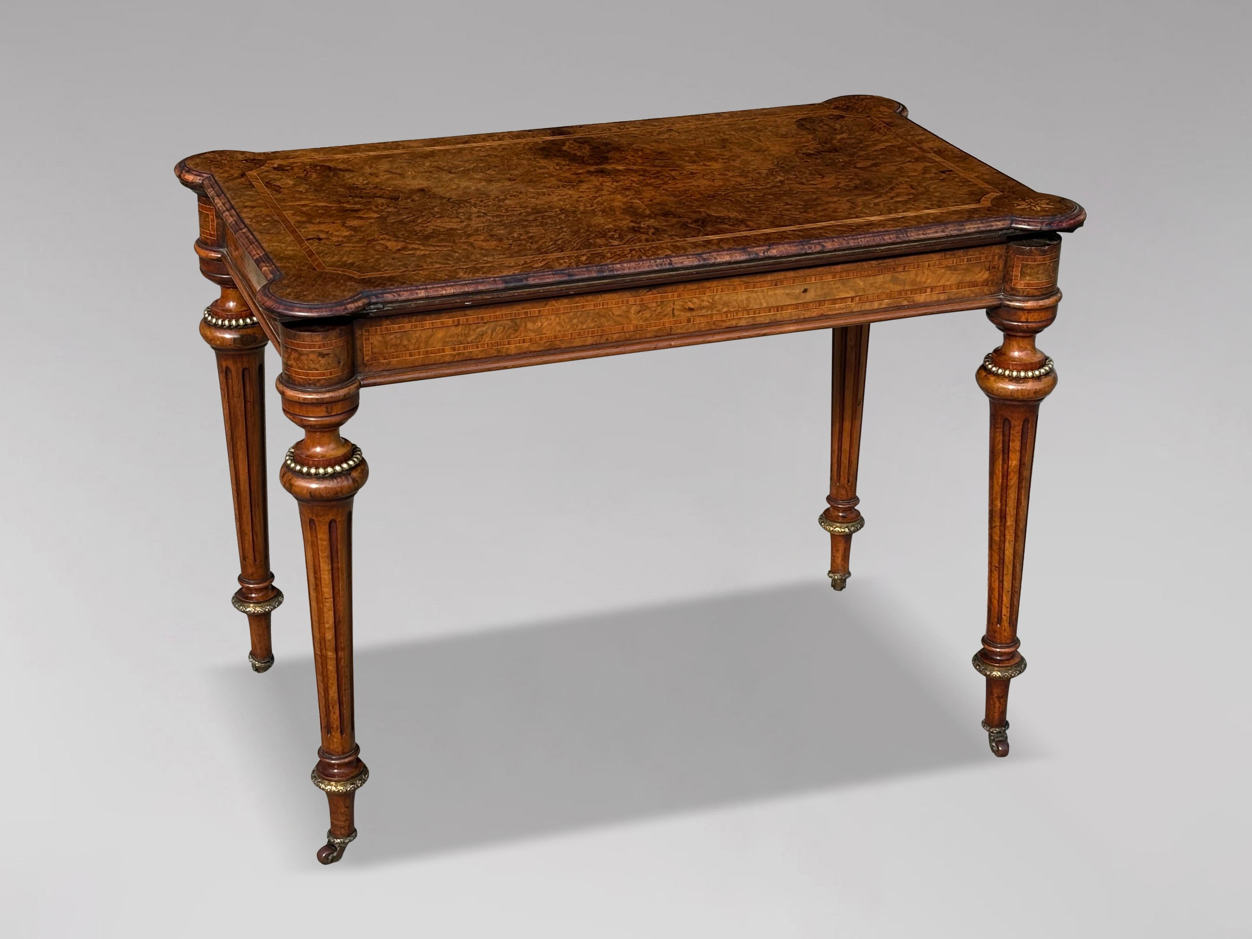 A very fine and elegant 19th-century Victorian period burr walnut inlaid card table. The rectangular top, featuring rosewood crossbanding and rounded corners, swivels and folds open to reveal a green baize-lined playing surface. The frieze is also
