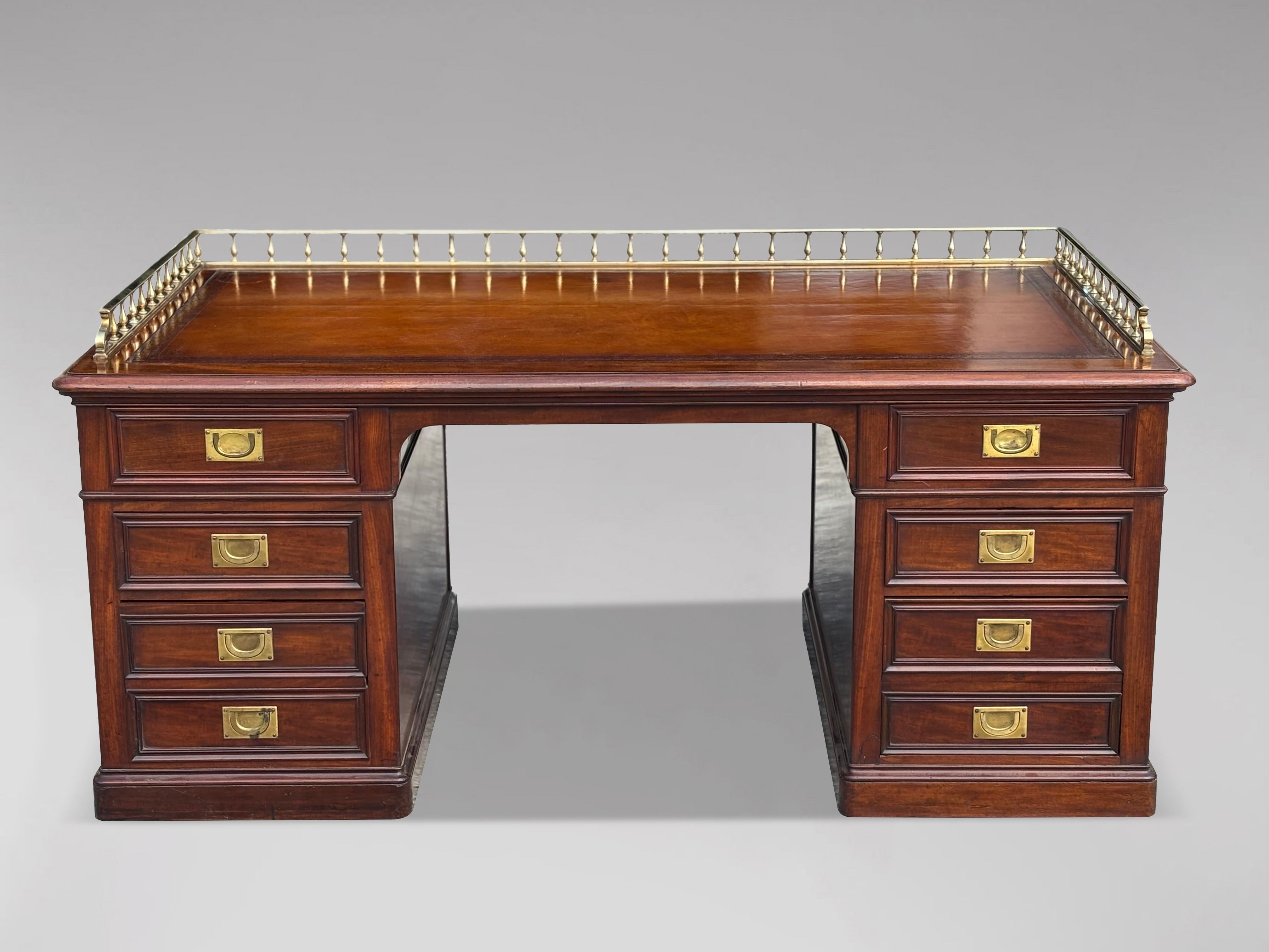 A Stunning Quality Early Victorian Period Mahogany & Leather Campaign Pedestal Desk

This stunning mid 19th-century Victorian period mahogany and leather top pedestal campaign desk is a masterpiece of design and functionality, featuring a newly