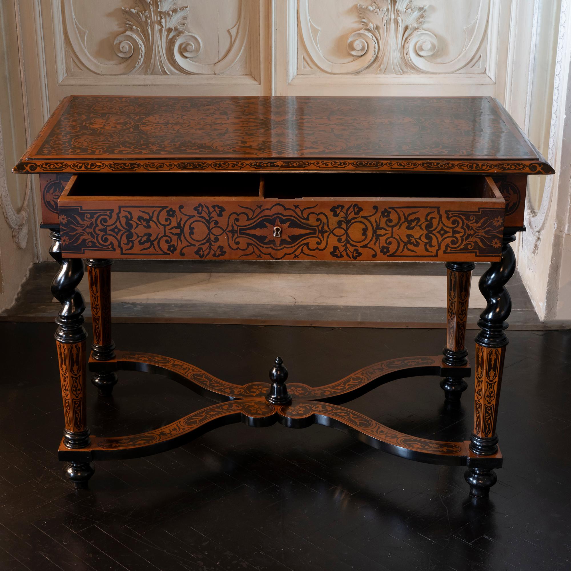 Mid-19th century French writing table Inlaid floral marquetry decoration of walnut and ebonized walnut.
One drawer which is fitted with the original working lock and key, the table stands on turned and marquetry legs joined by inlaid X-stretchers