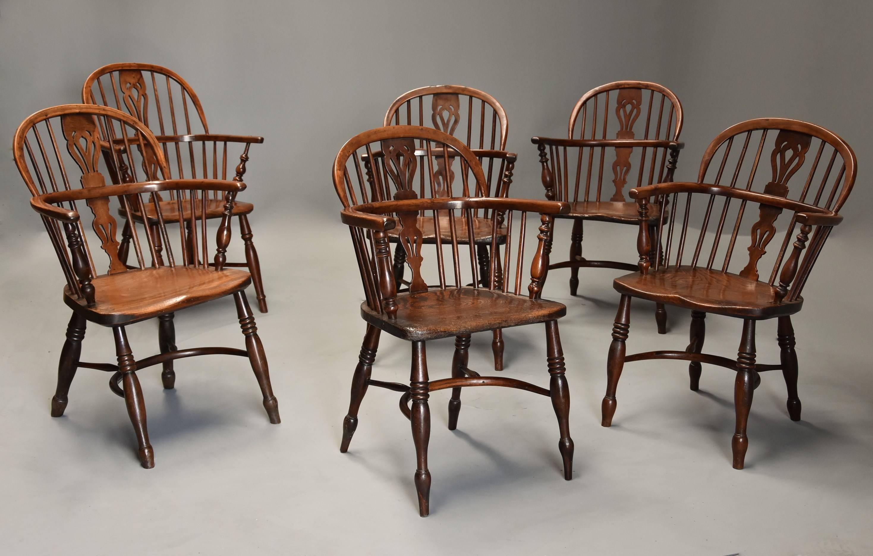 A well matched set of six mid-19th century (circa 1840) yew wood low back Windsor armchairs, five of the chairs matching with one very similar additional chair all of superb patina from the Rockley area of Nottinghamshire.

This set of chairs each