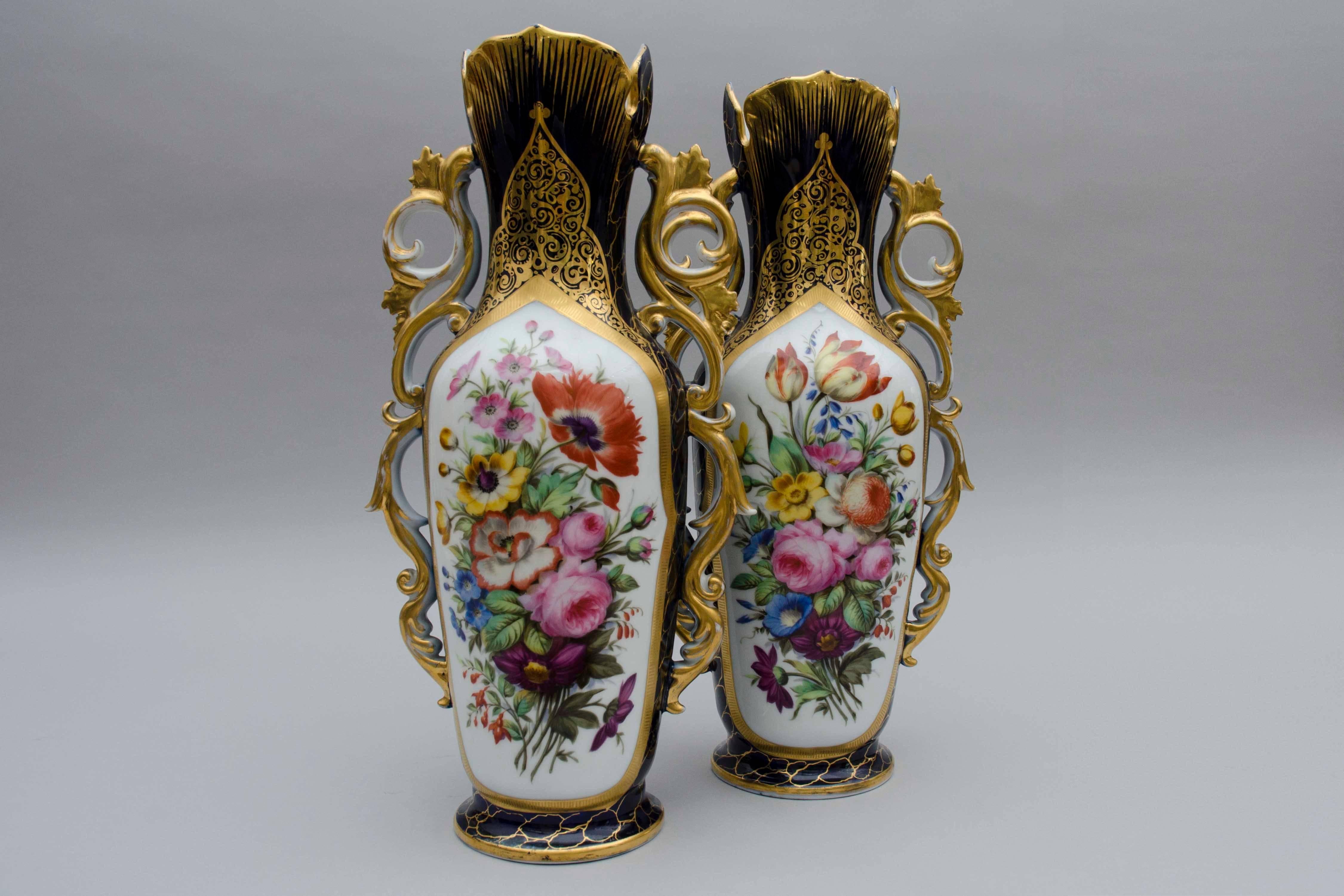 Rare pair of large vases with deep cobalt bleu ground, colourfull floral decorations with highlights of gold. Very decorative handles. Beautiful Valentine porcelain attributed to the talented Fouque workshop, circa 1860. Great condition, some gilt