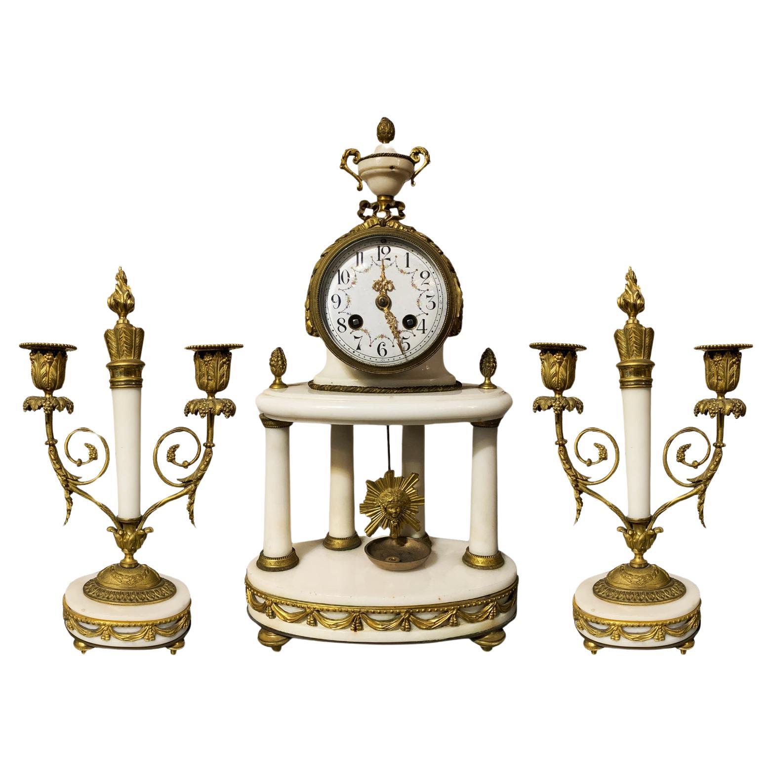 MID 19thCENTURY TRIPTYRY CLOCK AND CANDLESTICKS For Sale