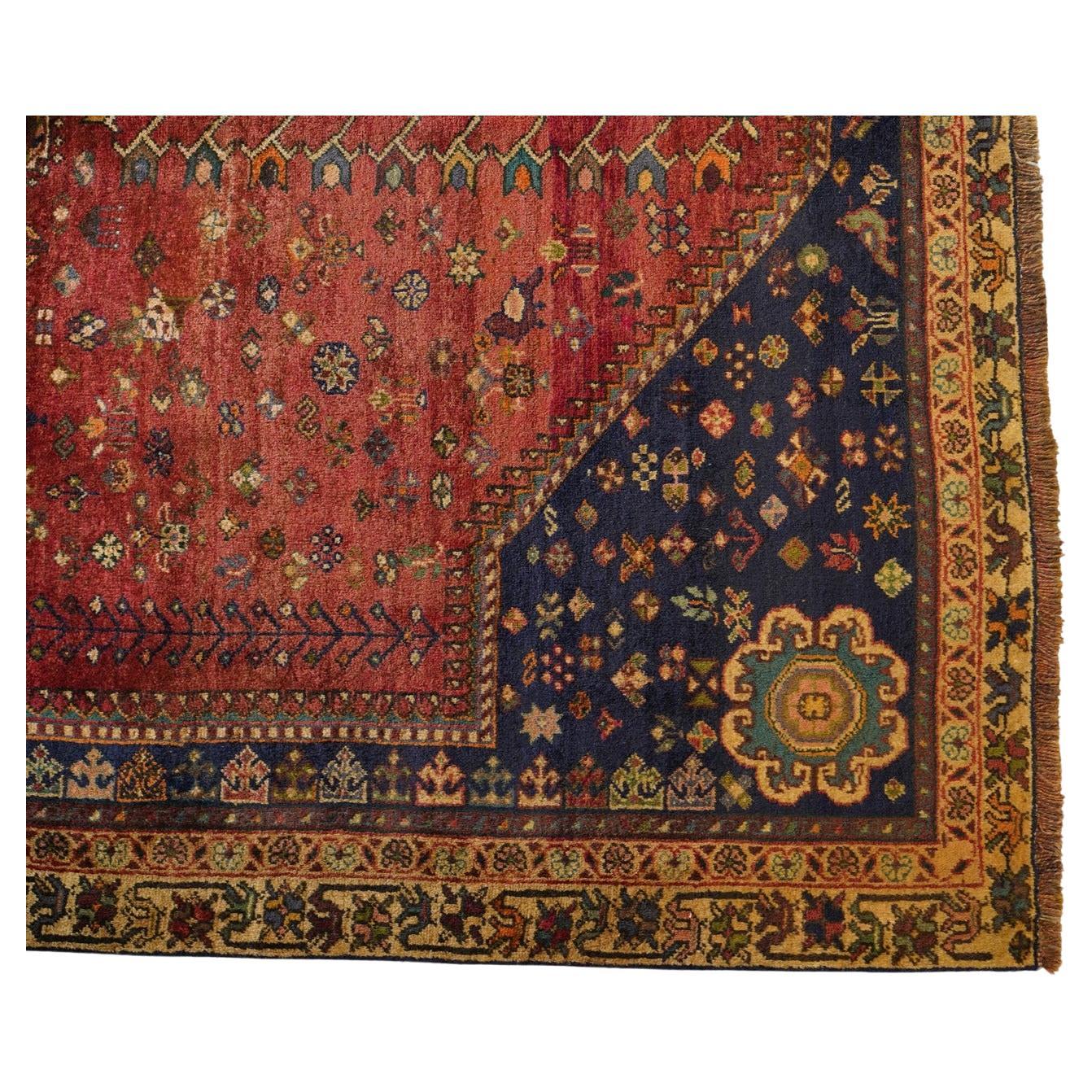 This hard to find look and feel in vintage Qashgai weaving combines elegance with the underlying use of traditional tribal symbols and is of a tighter, finer weave—and of a higher wool quality-- than often found in such tribal pieces. Its medium