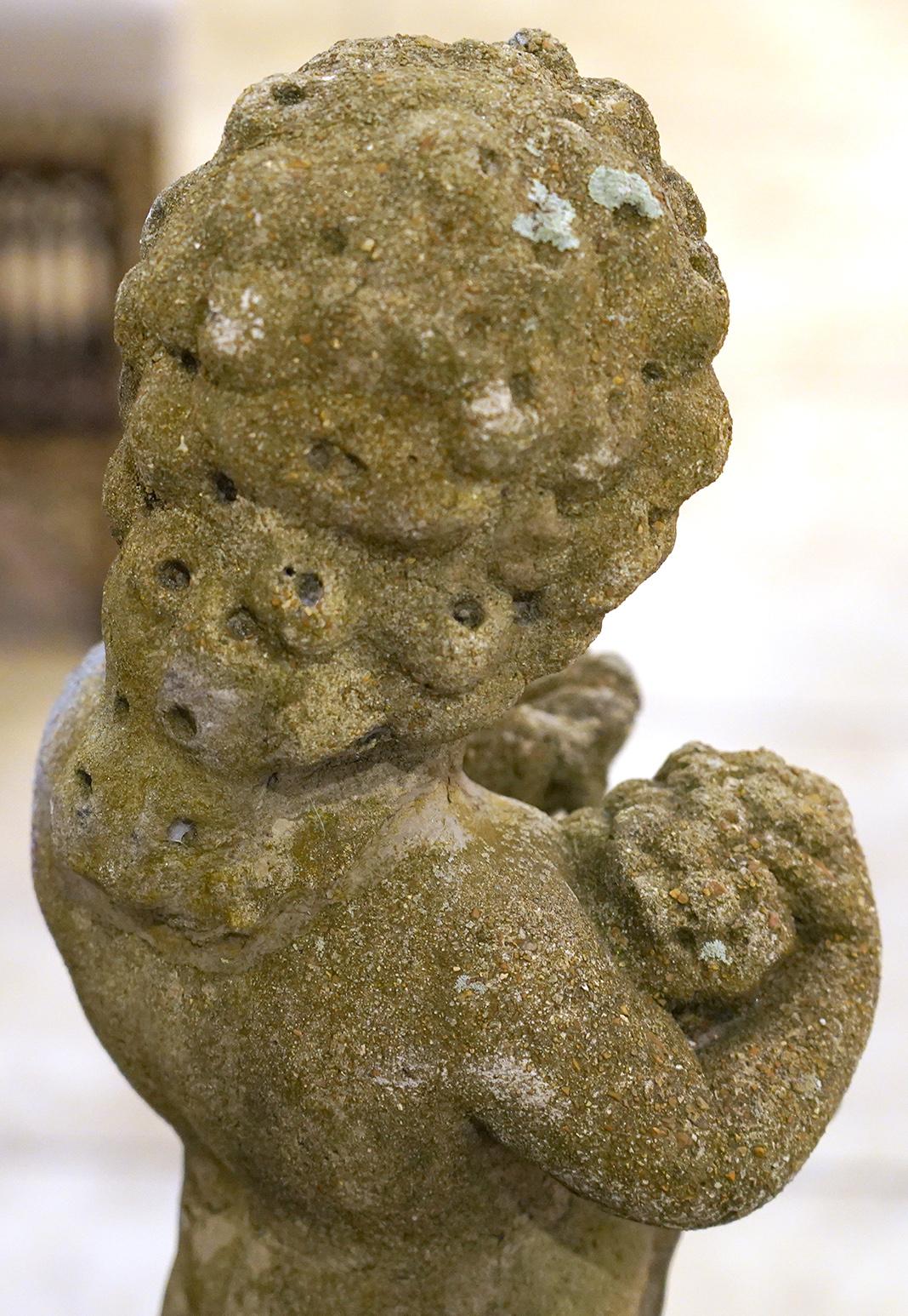 Mid-20th C. Cement Statue of a Putti Holding Grapes and Shell on a Fitted Base In Good Condition In Ft. Lauderdale, FL