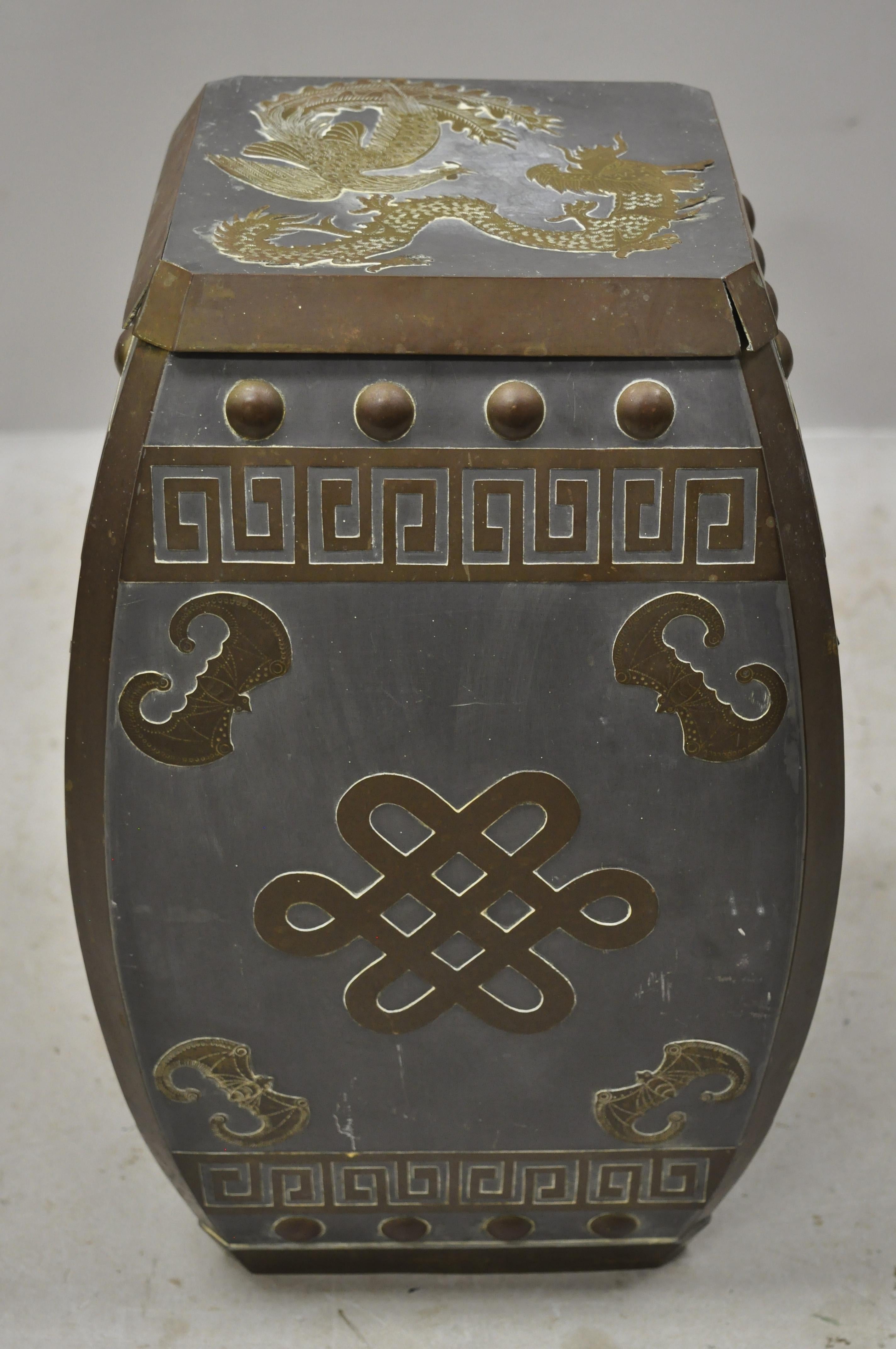 Mid-20th century Chinese oriental pewter and brass garden drum stool drinks table. Item features ornate brass detail, dragon and hou-ou bird top, Greek key design, heavy pewter construction, circa early to mid-20th century. Measurements: 18.5