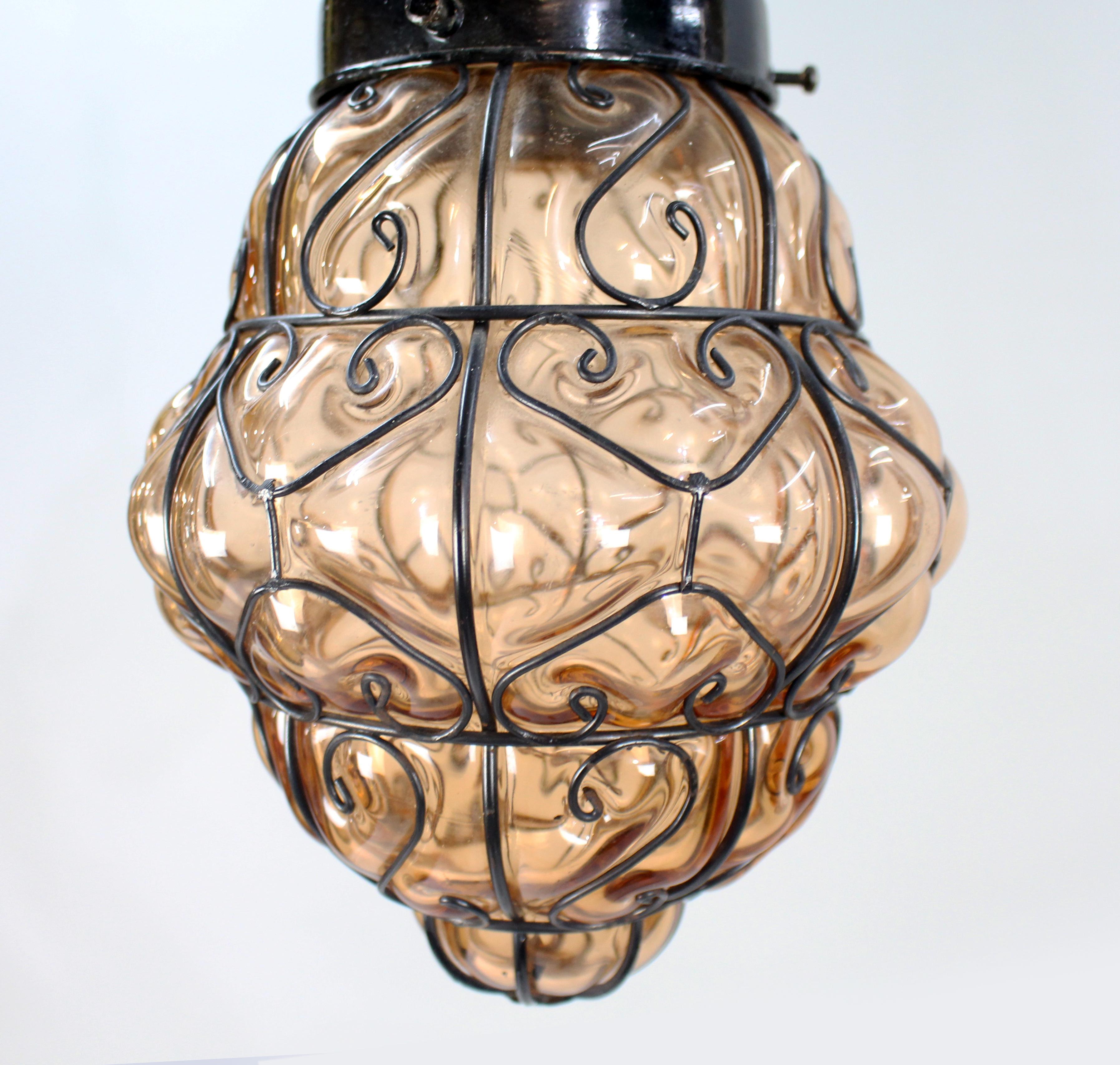 Blown Glass Mid 20th C. Handblown Seguso Murano Amber Glass Caged Pendant Light For Sale