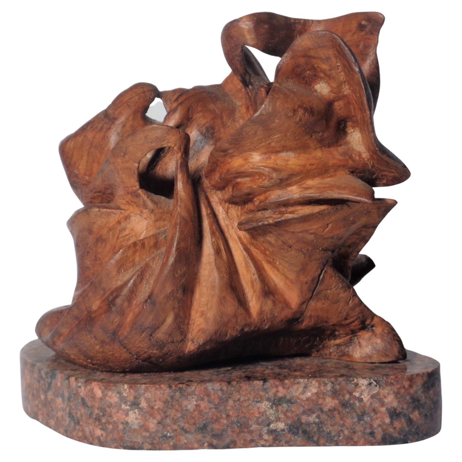  Naturalistic hand carved wood sculpture in beautifully aged surface color, mounted on the original polished granite base. Hand signed twice at lower points at two different sides near bottom. W.C. Rubottom ( see pictures ) Information found -