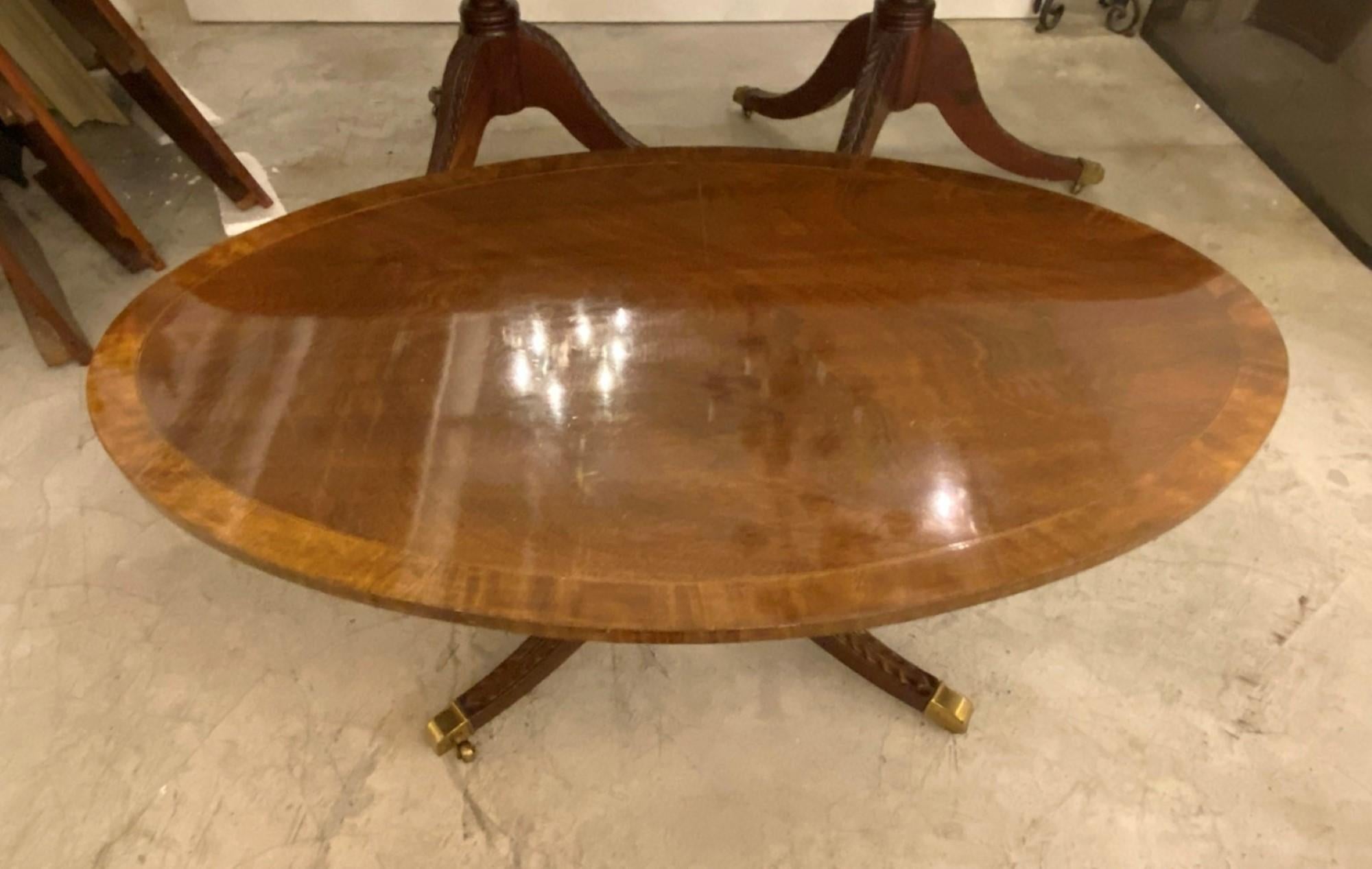 Mid-20th C. Oval Inlaid Walnut Coffee Table Brass Feet with Wheels In Good Condition In New York, NY