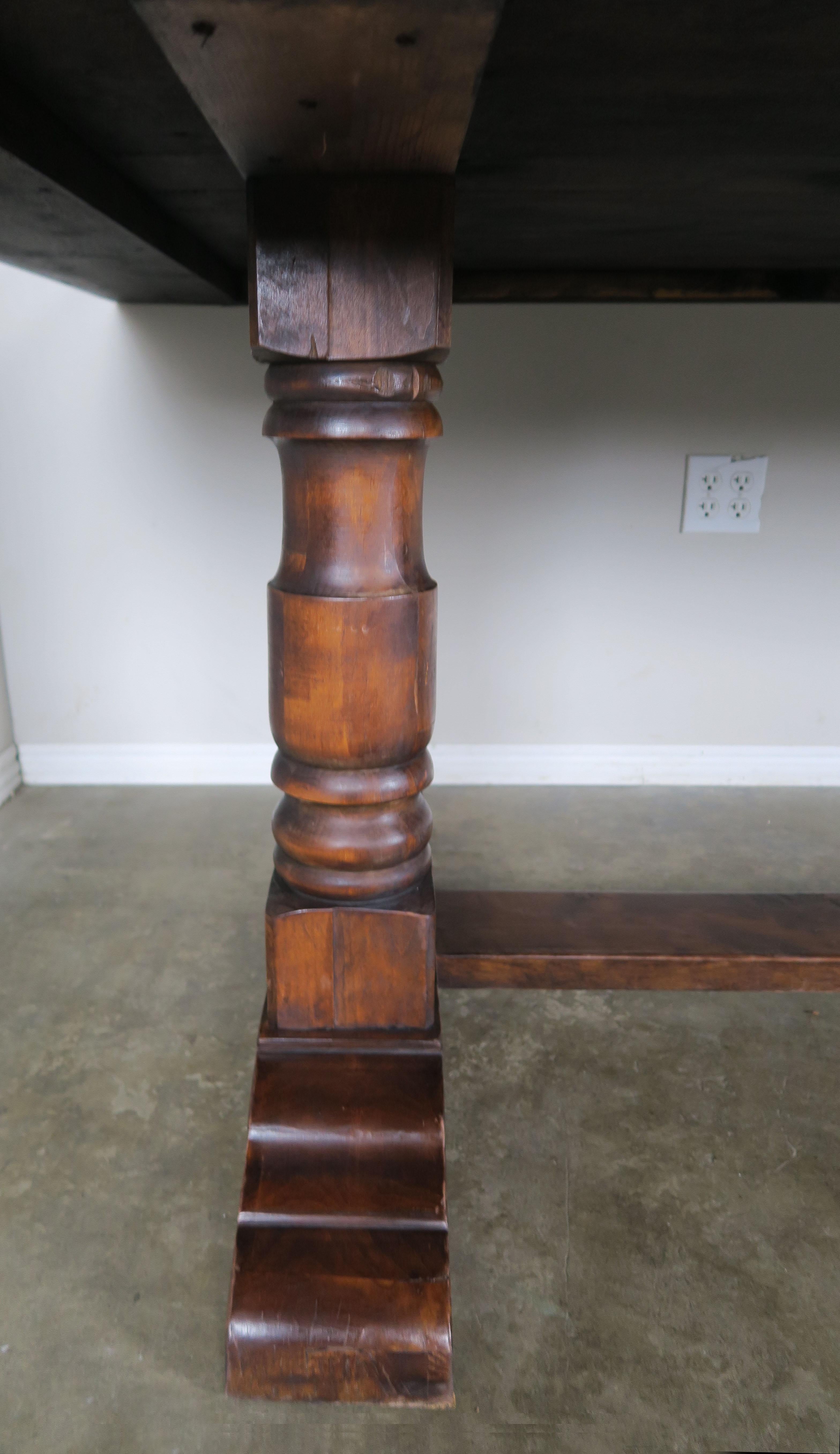 Mid-20th Century Spanish Walnut Trestle Table In Distressed Condition In Los Angeles, CA