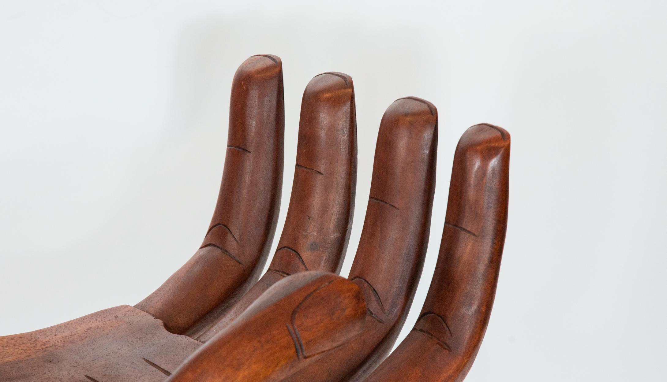 Mid-20th century wooden hand chair. Carved from an attractive warm red wood. Measure: 24