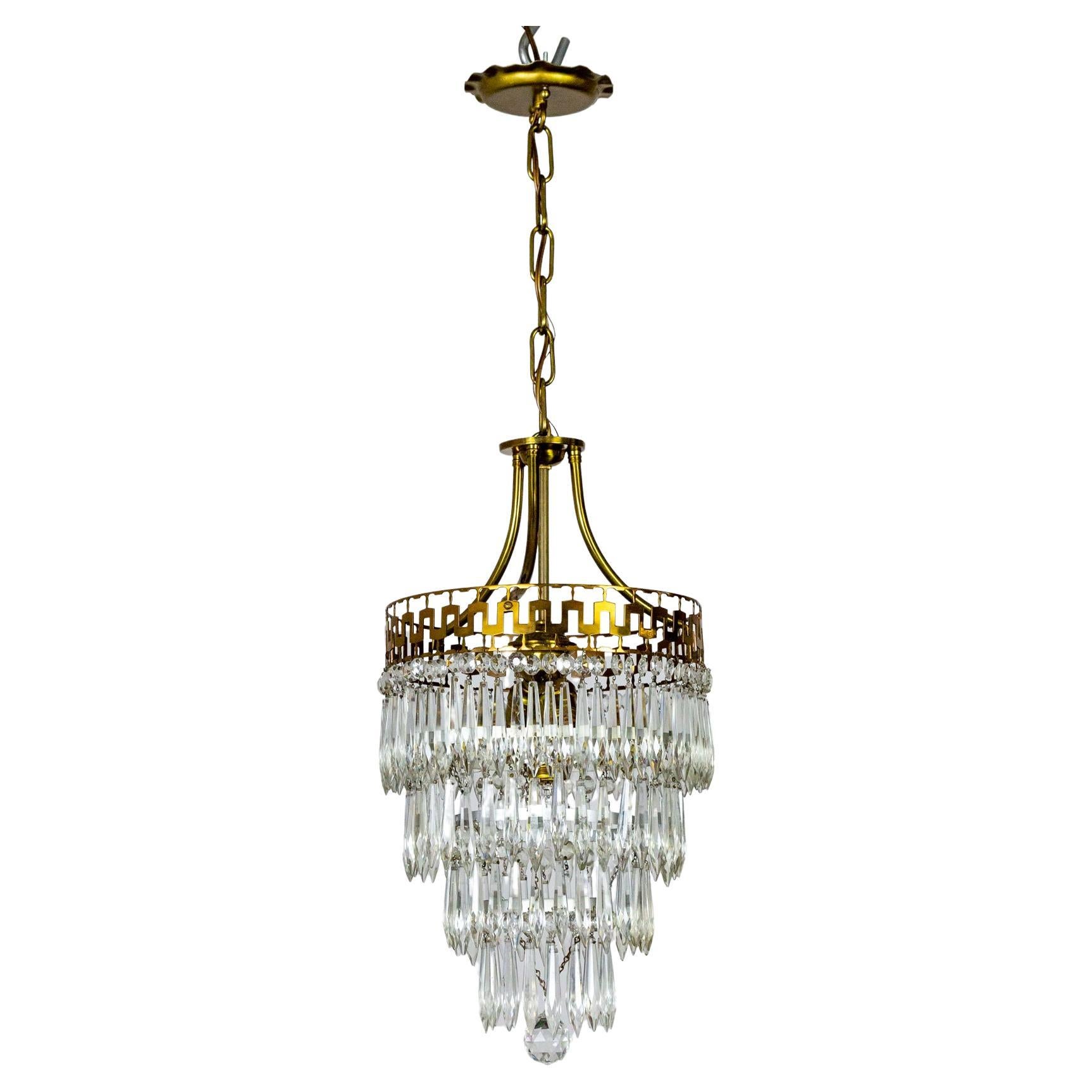 Mid-20th Cent. Neoclassical Cut Brass & Crystal Wedding Cake Pendant Light For Sale