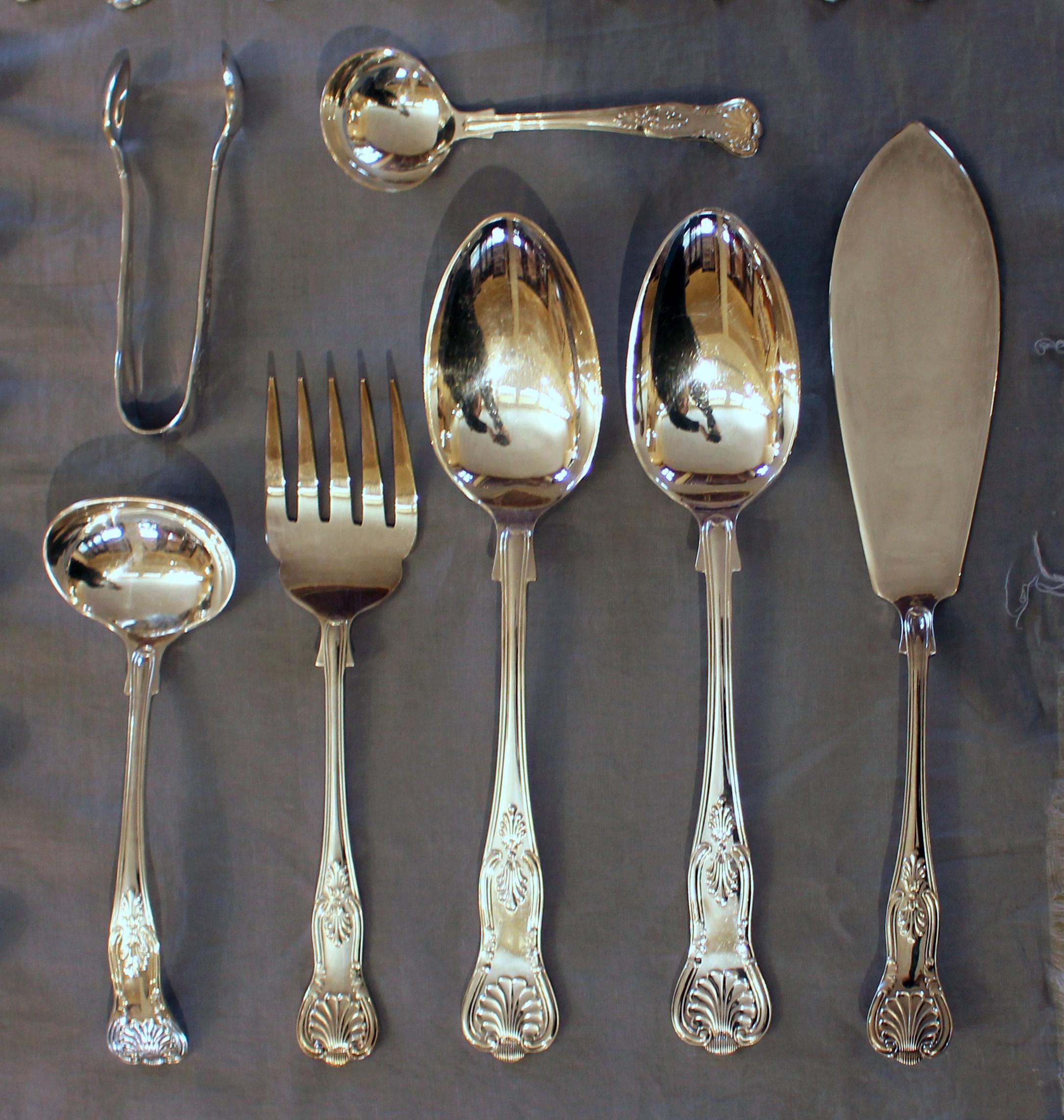Mid-20th century 127 piece King's Pattern Flatware Service for 12 by Mappin & Webb. Double struck design. Marked: Plate or Mappin Plate, Mappin & Webb, and cartouche with date letters. Very good condition. 12: dinner knives, dinner forks, soup
