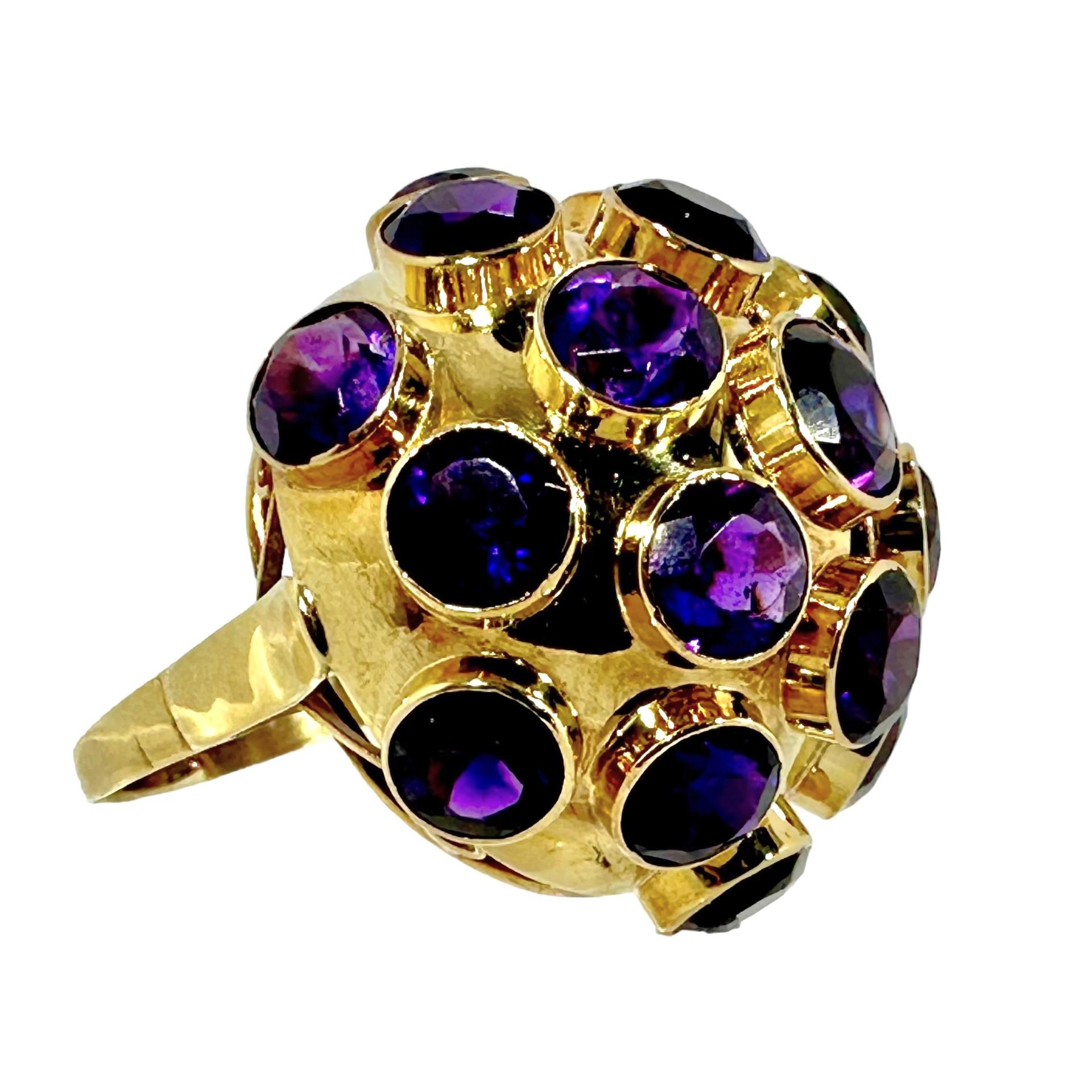 This wonderful and imaginative 18k yellow gold dome ring and others of this genre were no doubt inspired during the 