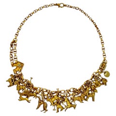 Mid-20th Century 18K Yellow Gold Canine Charm Motif Necklace by Oreste Guidi