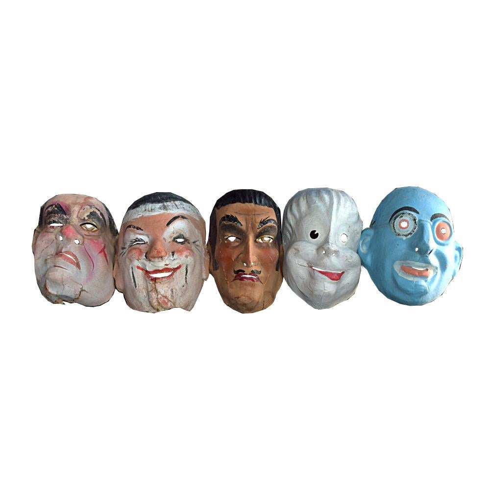 5 French Papier Mache Theatre masks 
We are proud to offer a set of five mid-20th century French papier Mache/card, hand painted theatre masks. An unusual looking bunch, we are sure you will agree. With variations of aged damage and repairs, these