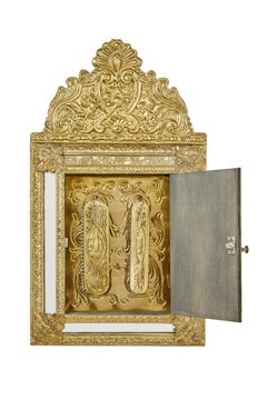 Mid 20th century aesthetic movement inspired brass hall cushion mirror