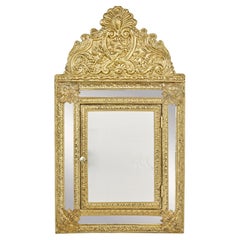Retro Mid 20th century aesthetic movement inspired brass hall cushion mirror