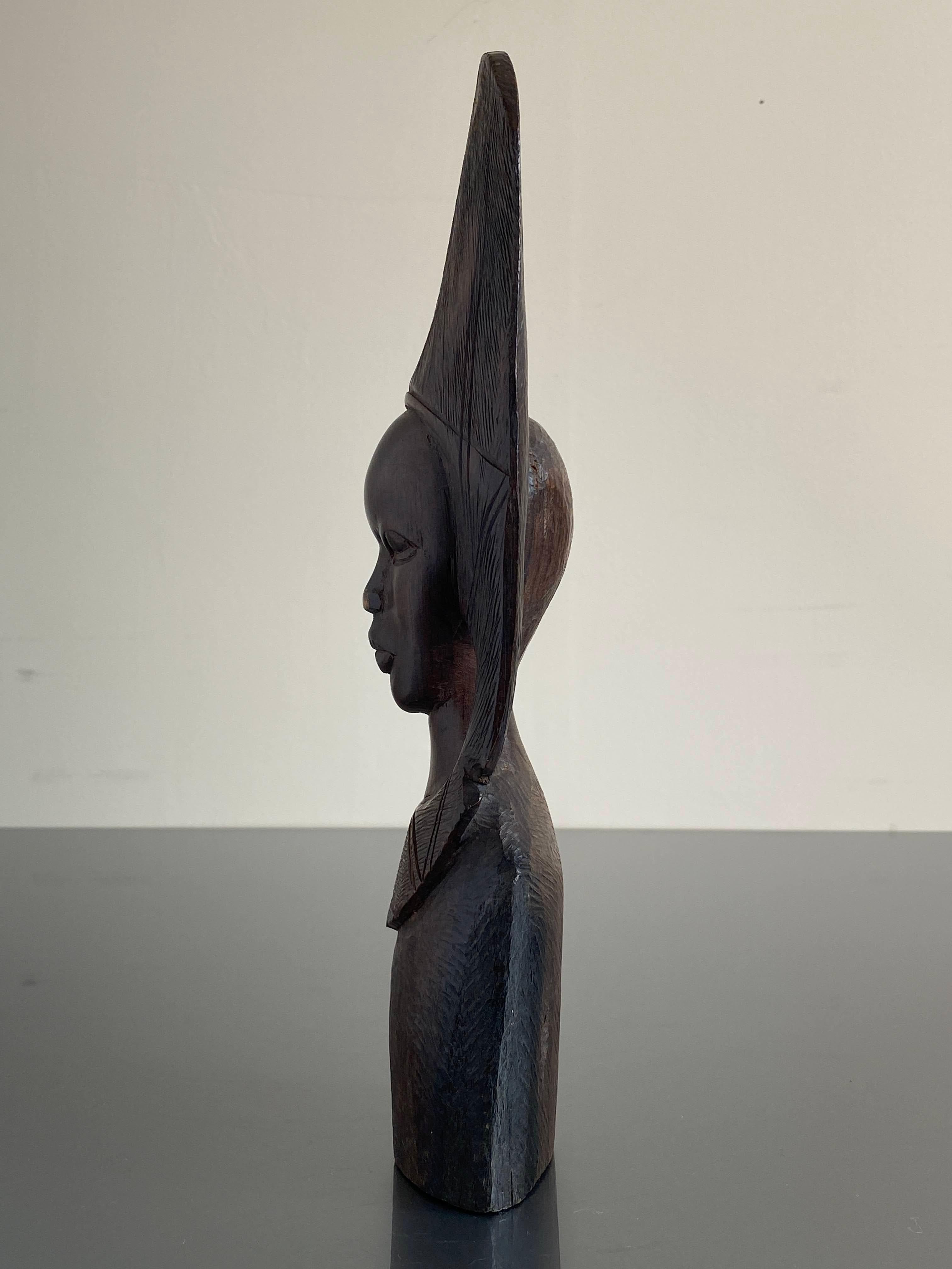 Carved Mid 20th Century African Folk-Art Carving of a Woman For Sale