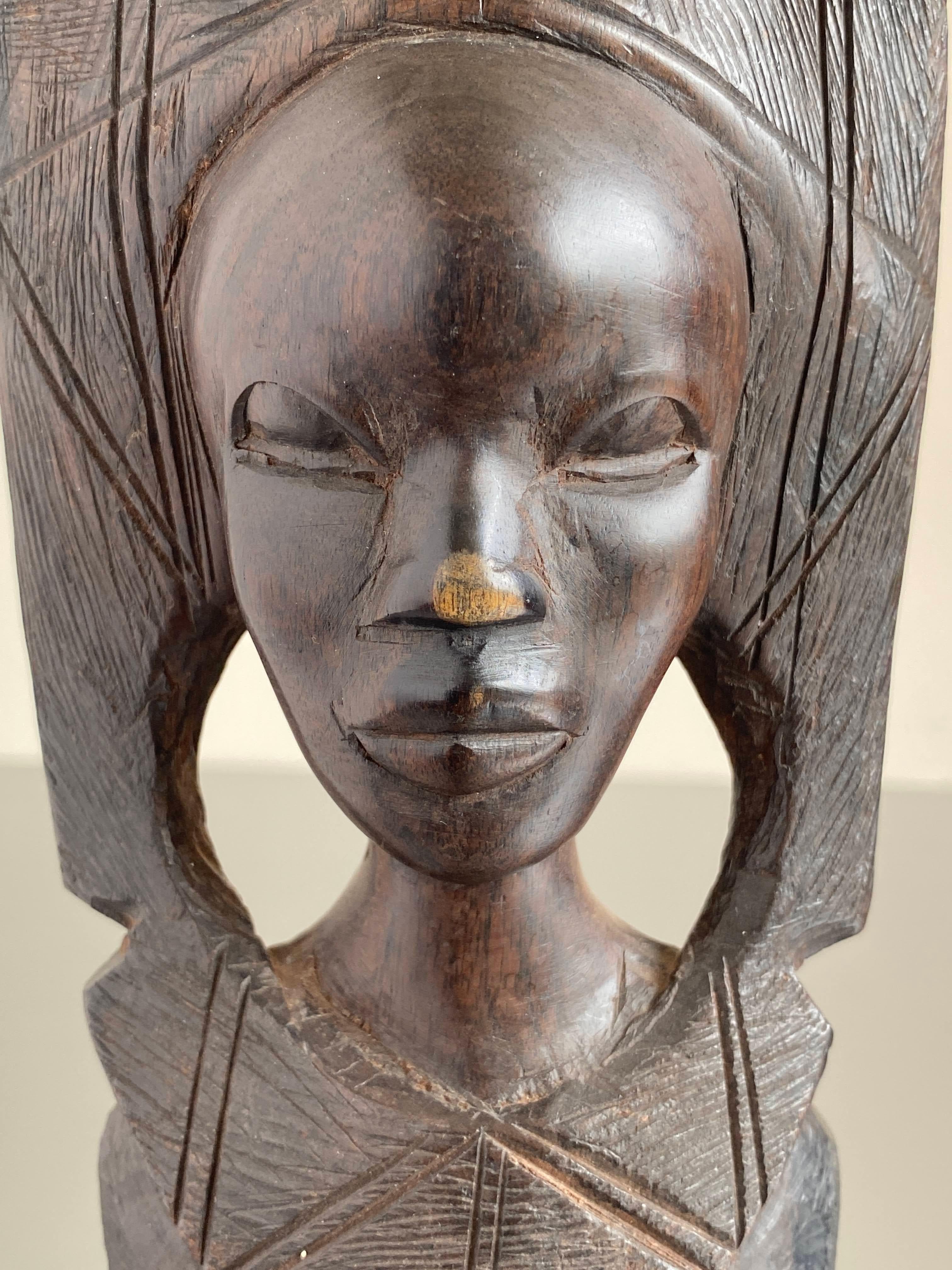 Wood Mid 20th Century African Folk-Art Carving of a Woman For Sale
