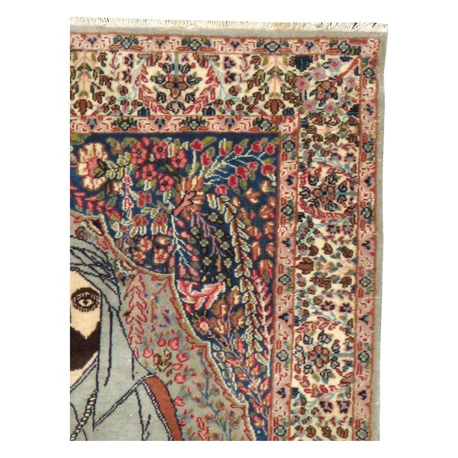 A vintage Persian Tabriz throw rug handmade during the mid-20th century with a pictorial design of 'Ali ibn Abi Talib and his symbolic lion.

Measures: 3' 2