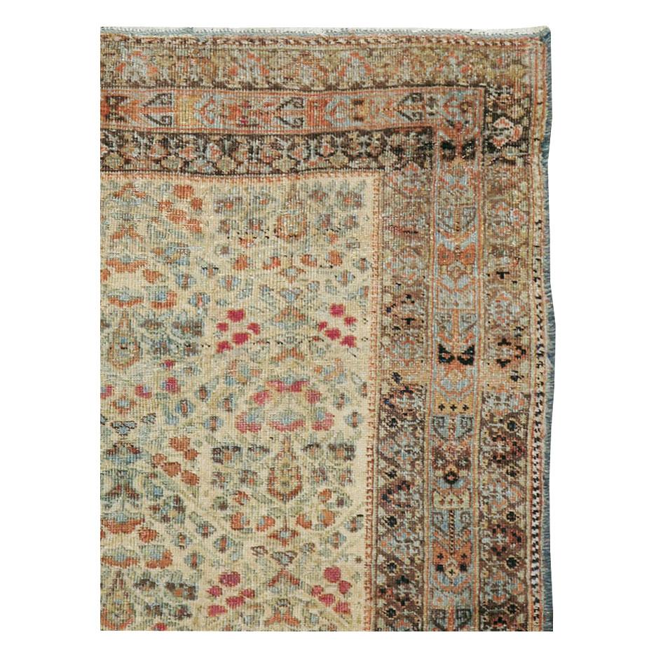 An antique Persian Afshar throw rug handmade during the early 20th century.

Measures: 3' 11