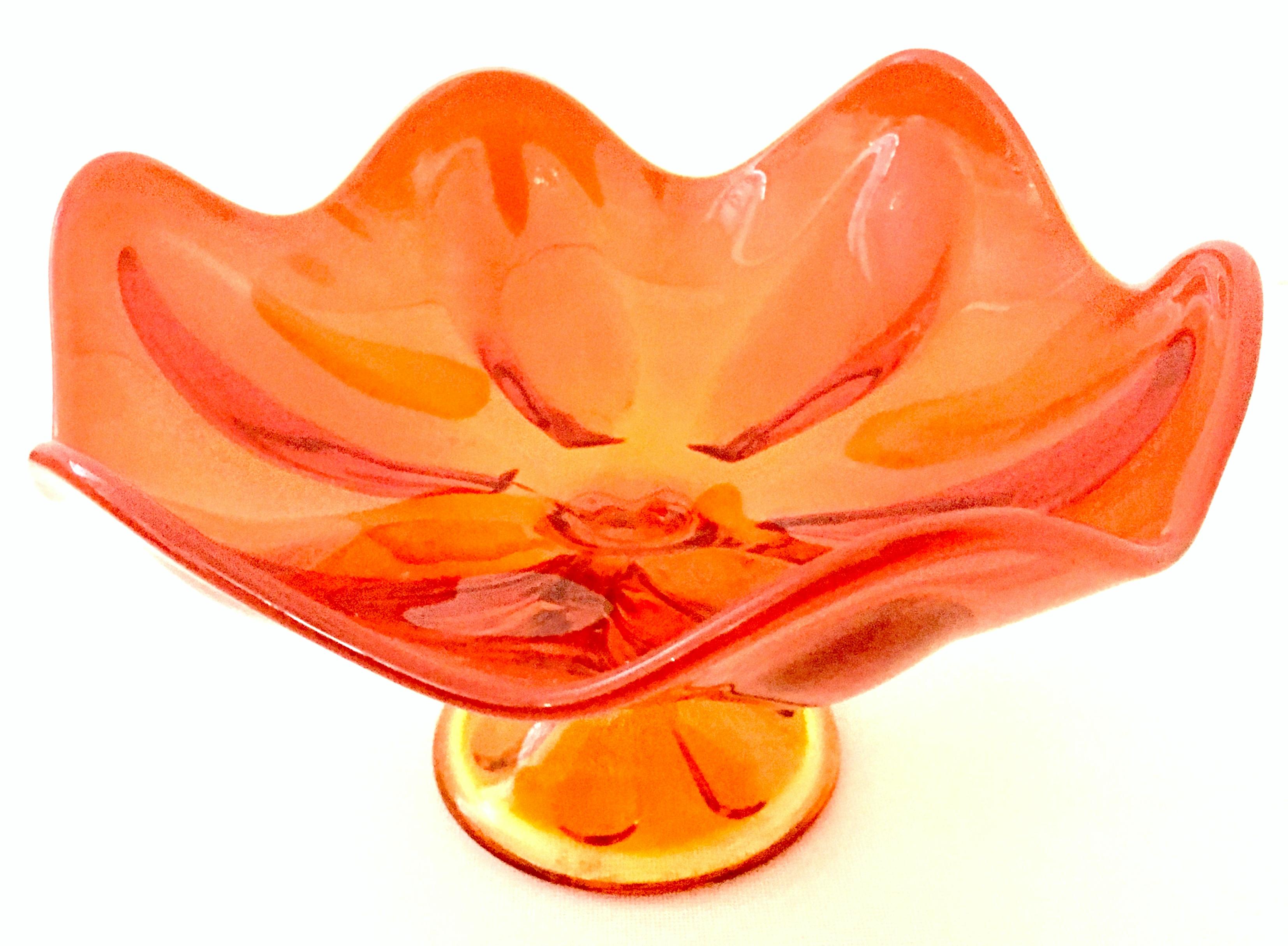 Mid-20th century American Tangerine Amberina art glass footed pedestal uffle center bowl.