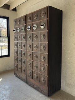 Mid 20th Century American Brutalist Oak/Glass/Bronze Knob Armoire
