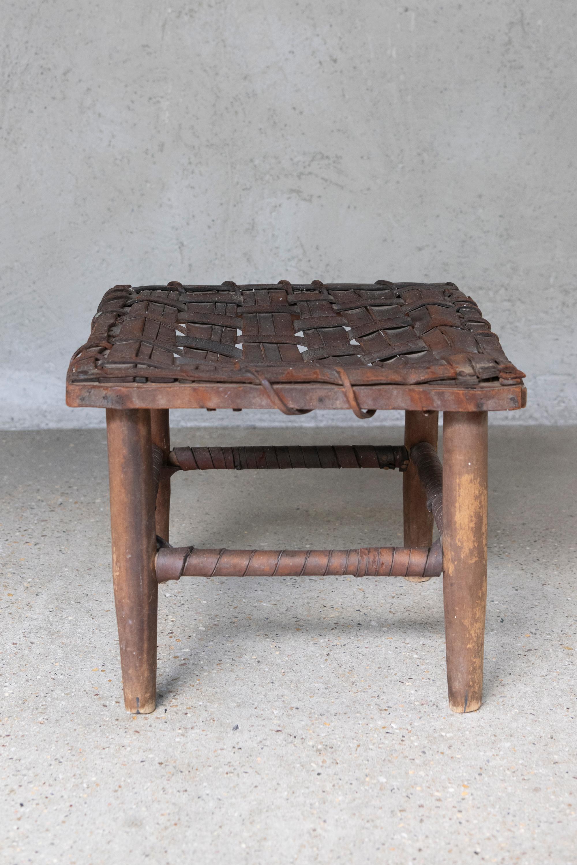 Hand-Crafted Mid 20th Century American Rustic Handwoven Leather & Wood Stool For Sale