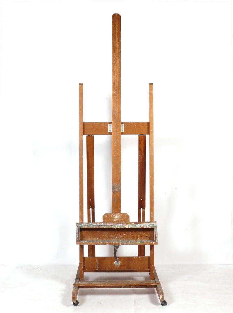 A vintage Anco Bilt paint covered artist's easel. The easel retains it's original paint covered and time worn patina. This easel hailed from the famous Westbeth artist commune in New York City. What is Westbeth? Good question and I'll let them tell