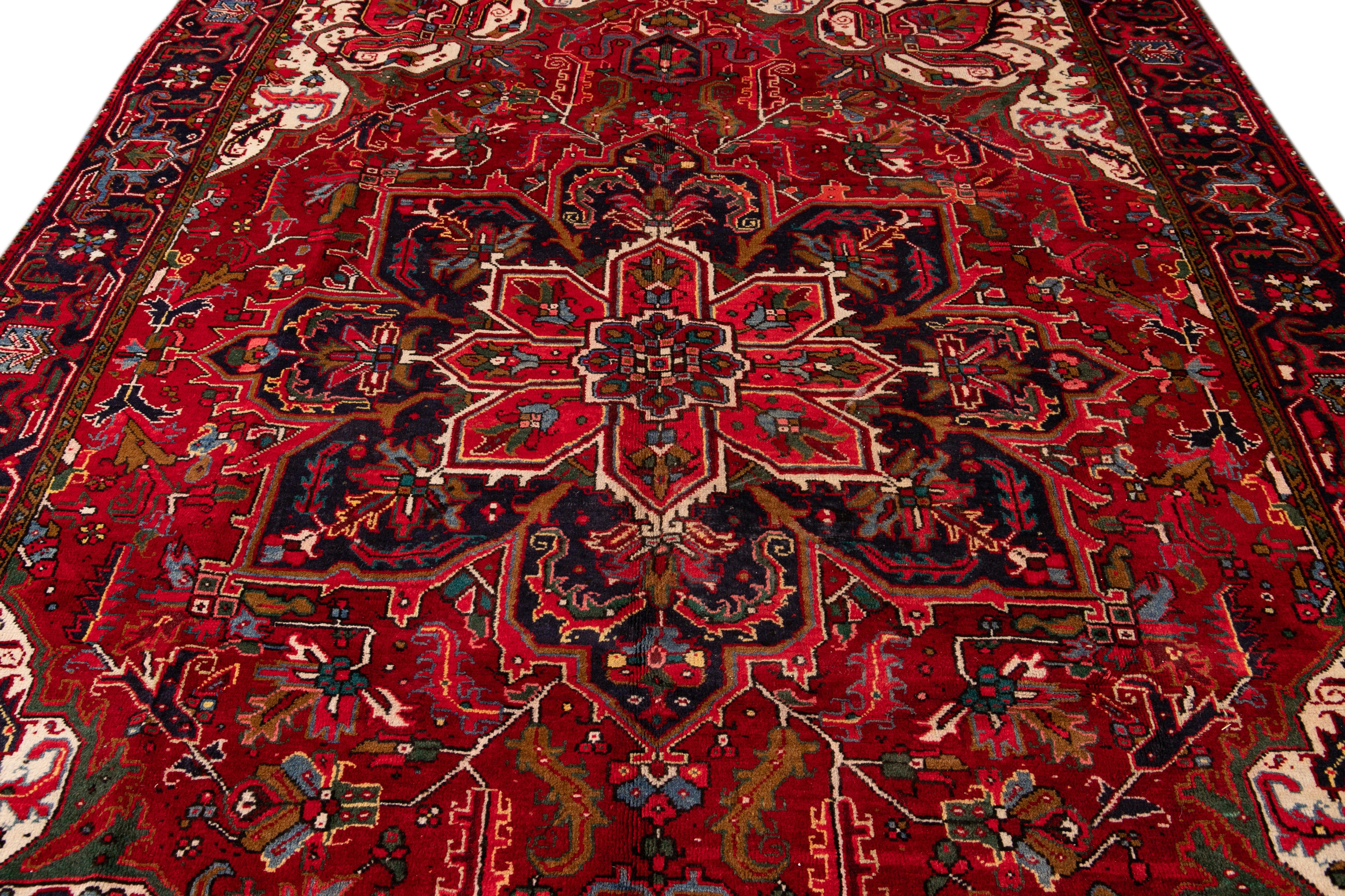 Hand-Knotted Mid-20th Century Antique Heriz wool Rug For Sale