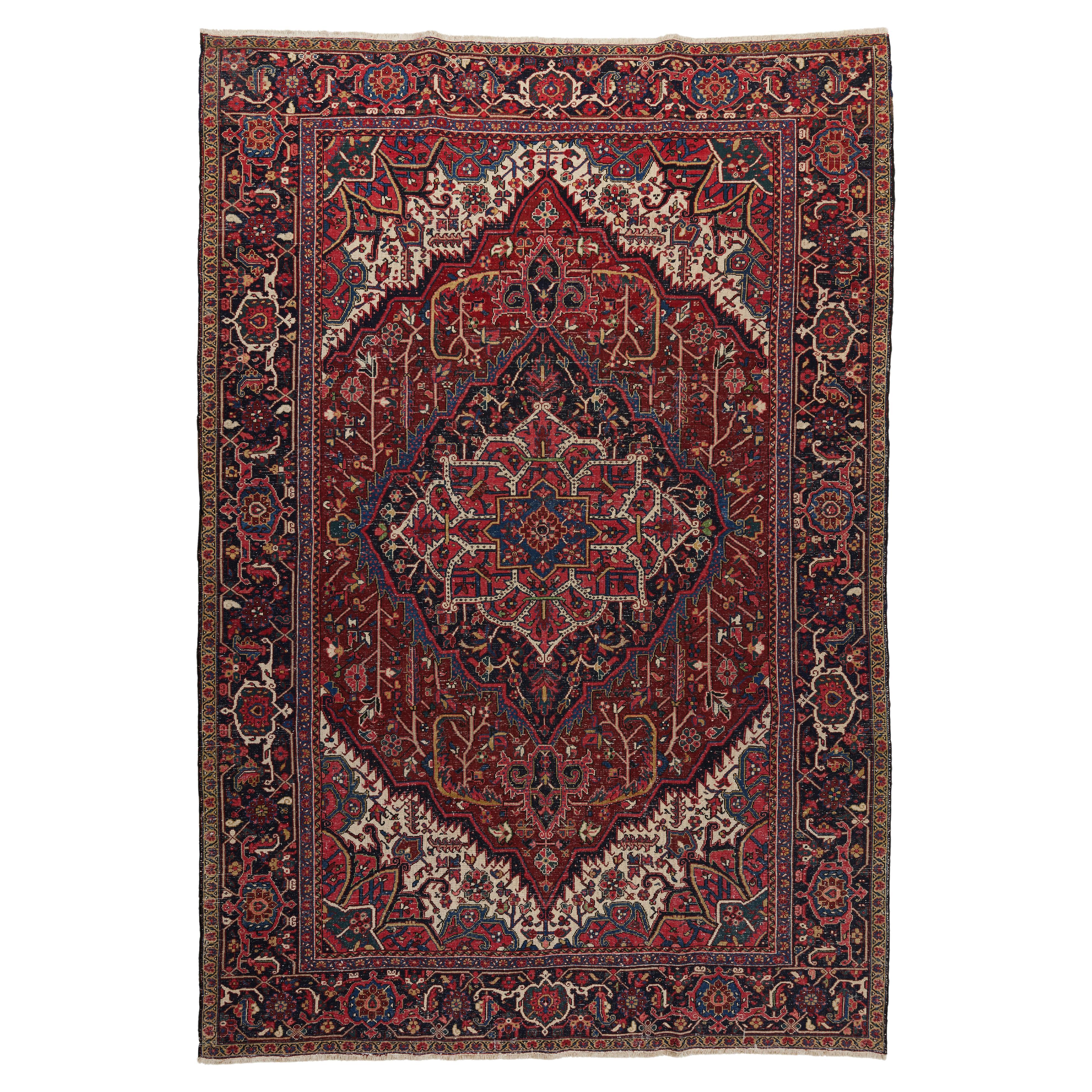 Mid 20th Century Antique Persian Heriz rug with rich reds, crimson, Burgundy For Sale