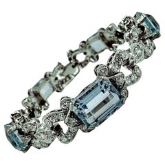 Bracelet cocktail en aigue-marine, diamant et platine du milieu du 20e siècle