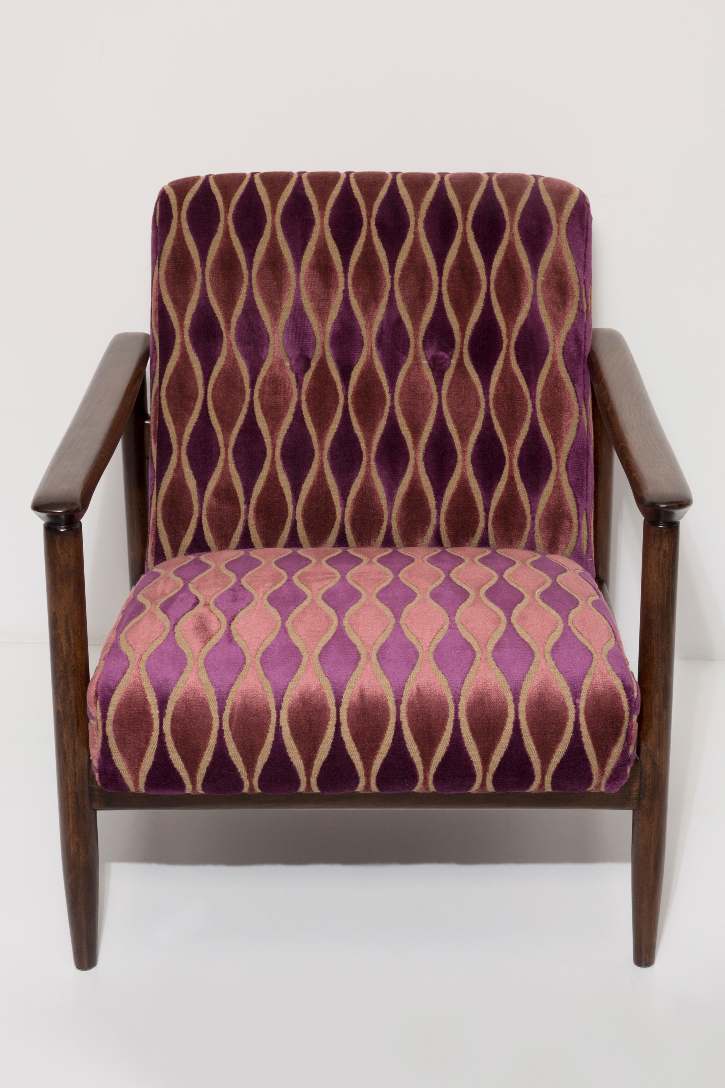Beautiful pattern pink and violet velvet Armchair GFM-142, designed by Edmund Homa, a polish architect, designer of Industrial Design and interior architecture, professor at the Academy of Fine Arts in Gdansk. 

The armchair was made in the 1960s