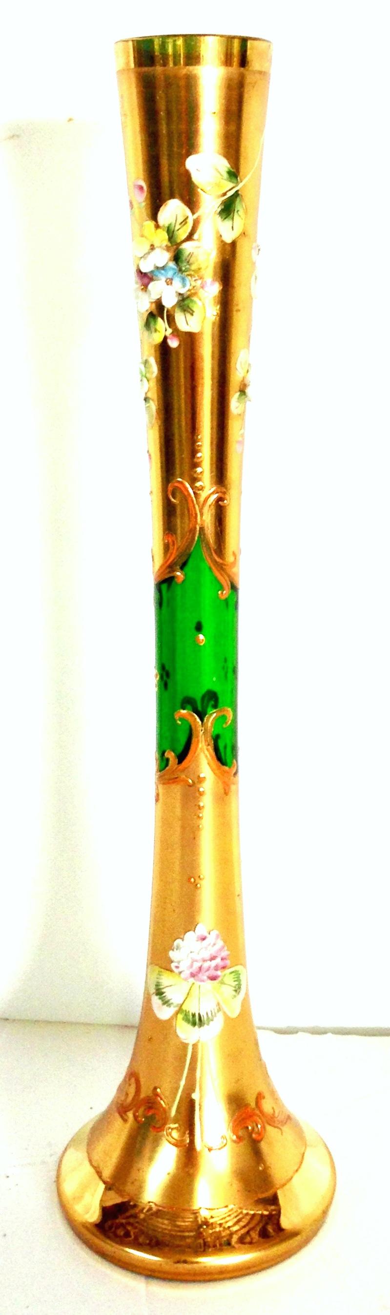 Mid-20th century Art Nouveau Bohemia art glass and 22-karat gold vase. Features a fluted shape with emerald green ground and heavily applied 22-karat gilt gold, hand painted floral motif.