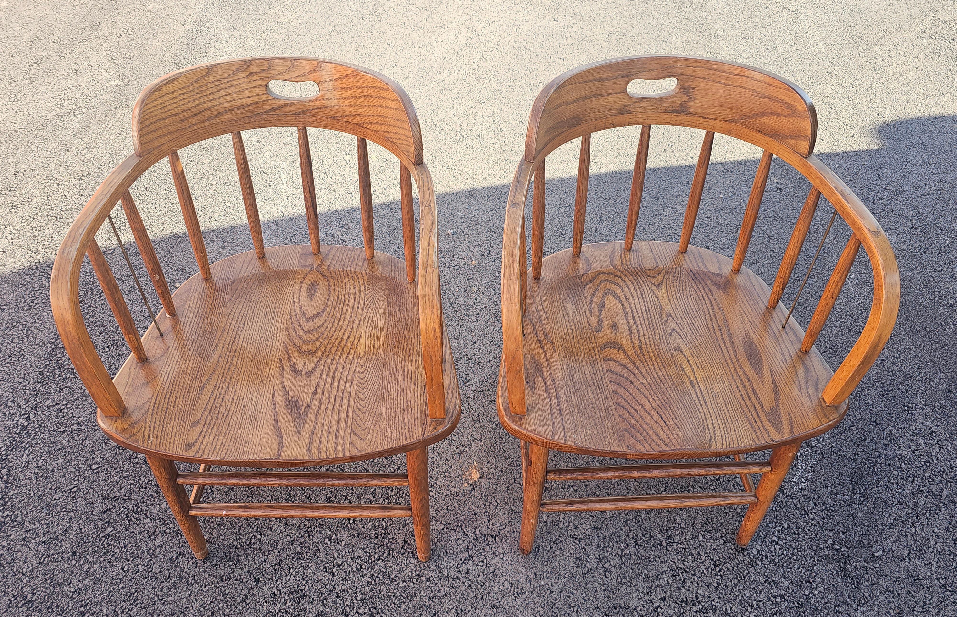American Mid 20th Century Arts and Crafts Firehouse Oak Windsor Chairs, Pair For Sale