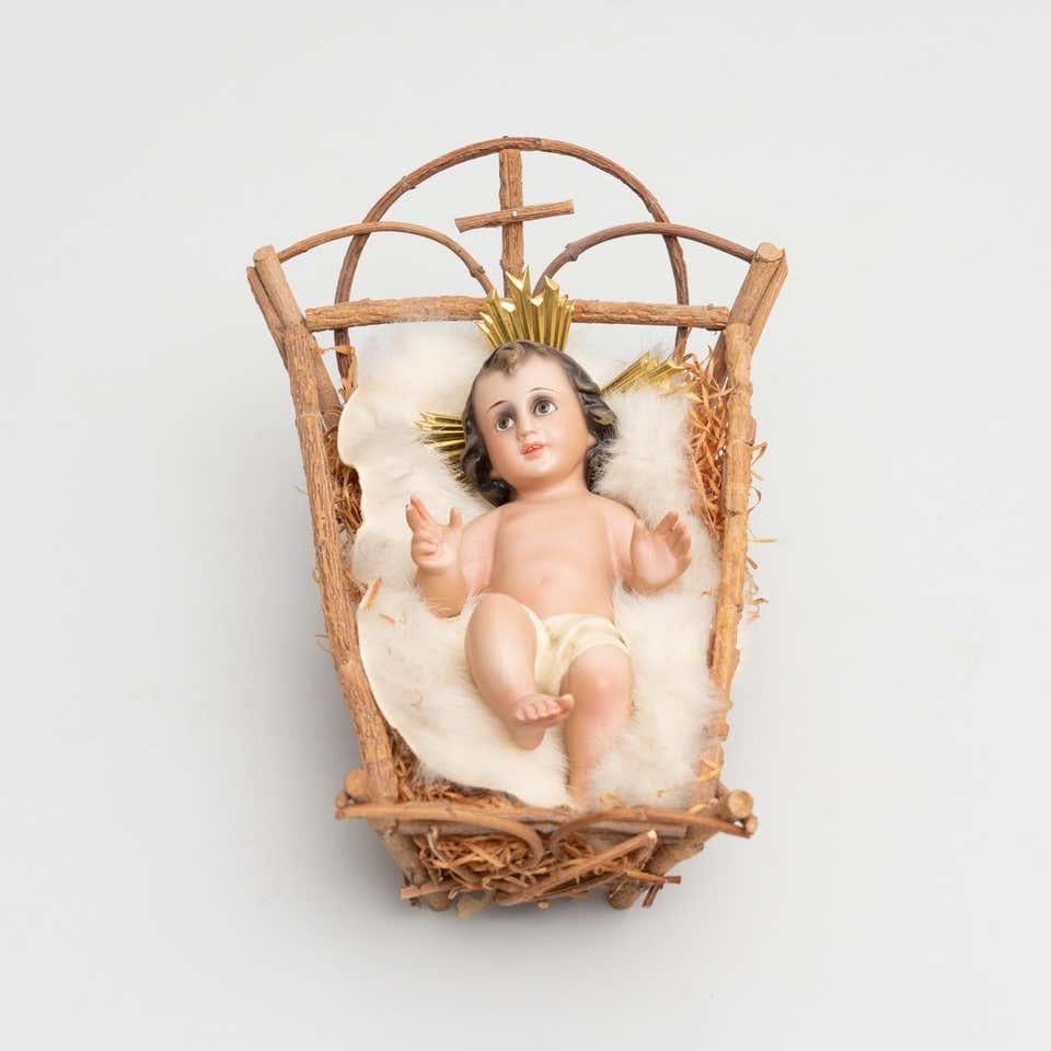 Dipinto a mano Figura di Gesù Bambino nella culla della metà del XX secolo in vendita