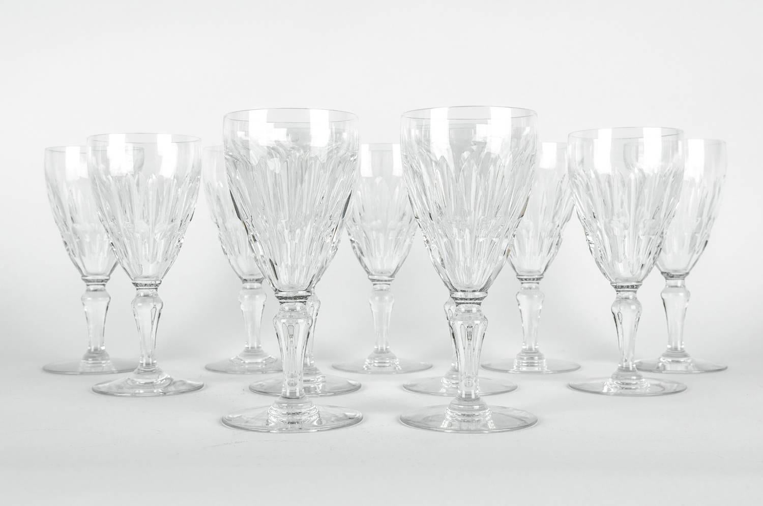 Mid-20th century Baccarat crystal wine glassware set of 11 pieces. Each glass is in excellent condition, each one measure 6.3 inches high x 3 inches bottom diameter.