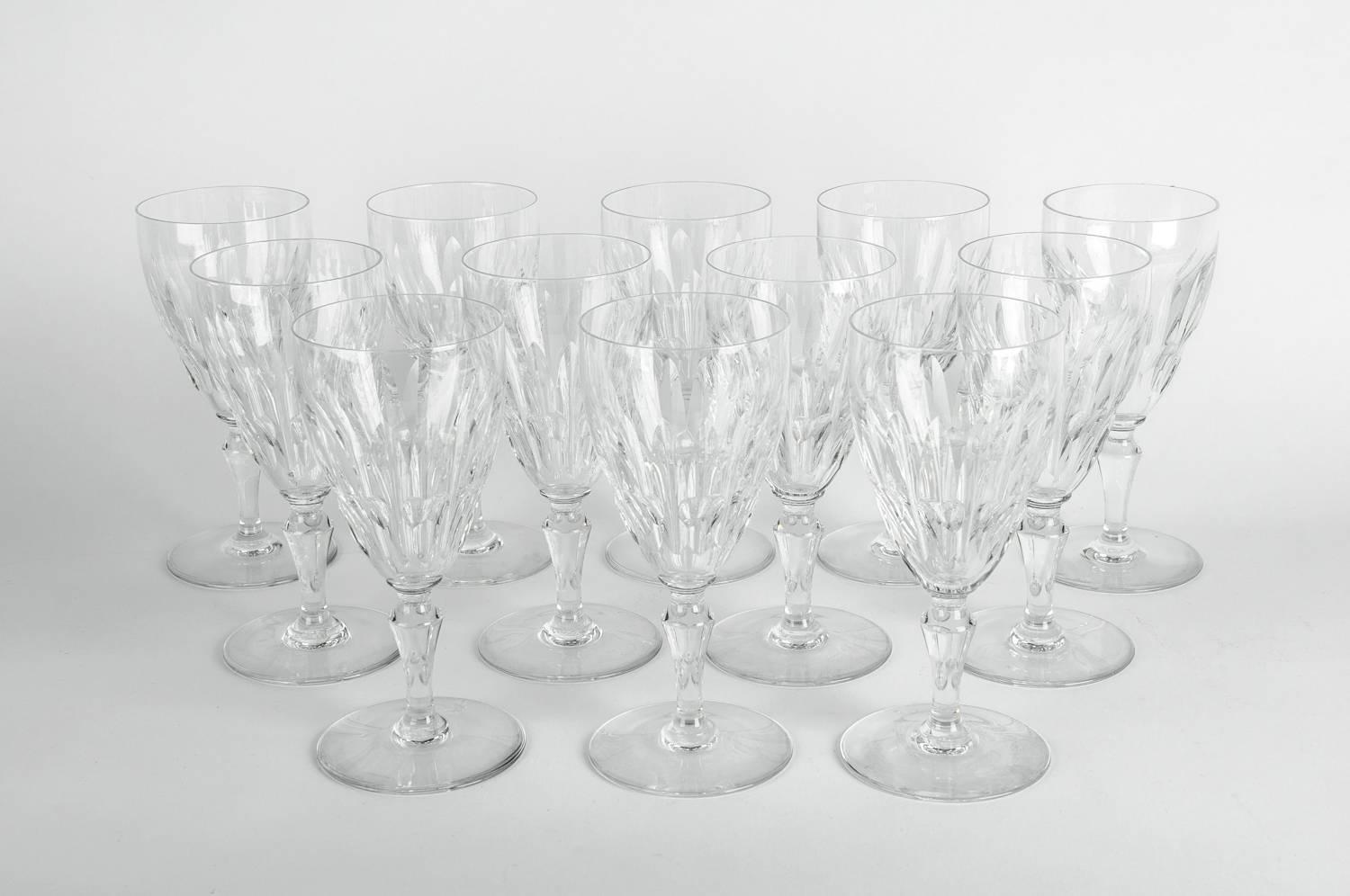 Mid-20th century Baccarat crystal wine / water glassware set of 12 pieces. Each glass is in excellent condition. Each glass measure 7.5 inches high x 3.5 inches bottom diameter.
