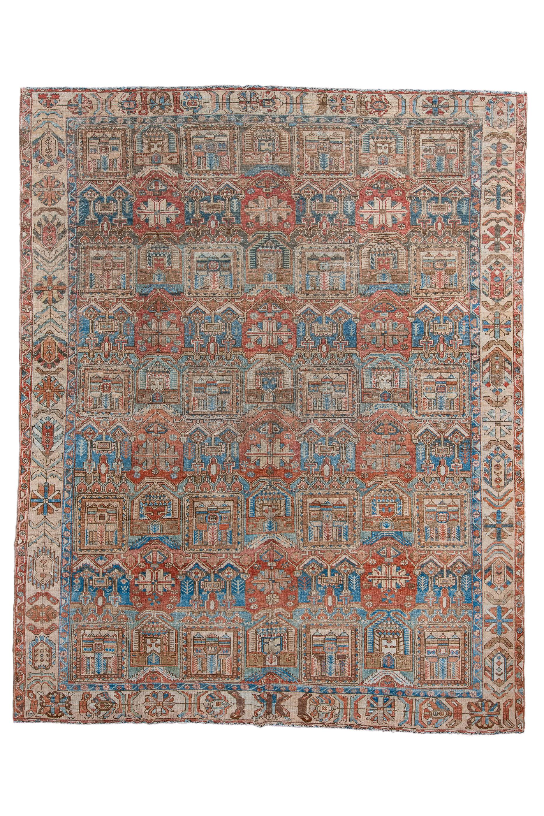 A sand border of chains of palmettes, flowers and rosettes, sets off the  closely set  seven column repeating pattern of  garden squares, single and double pent roof motives and red reserves in this Chahar Mahal village piece. Moderate/medium weave