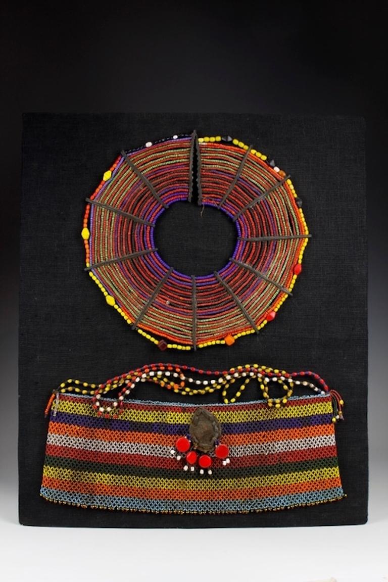 Among the Pokot, body adornments are visual signifiers of power, wealth and status within the community. Given as a gift to a new bride by her husband, this finely beaded neck adornment and matching apron would have been worn as an embodied symbol