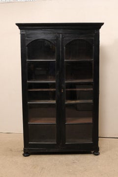 Vitrine haute coloniale britannique noire du milieu du 20e siècle