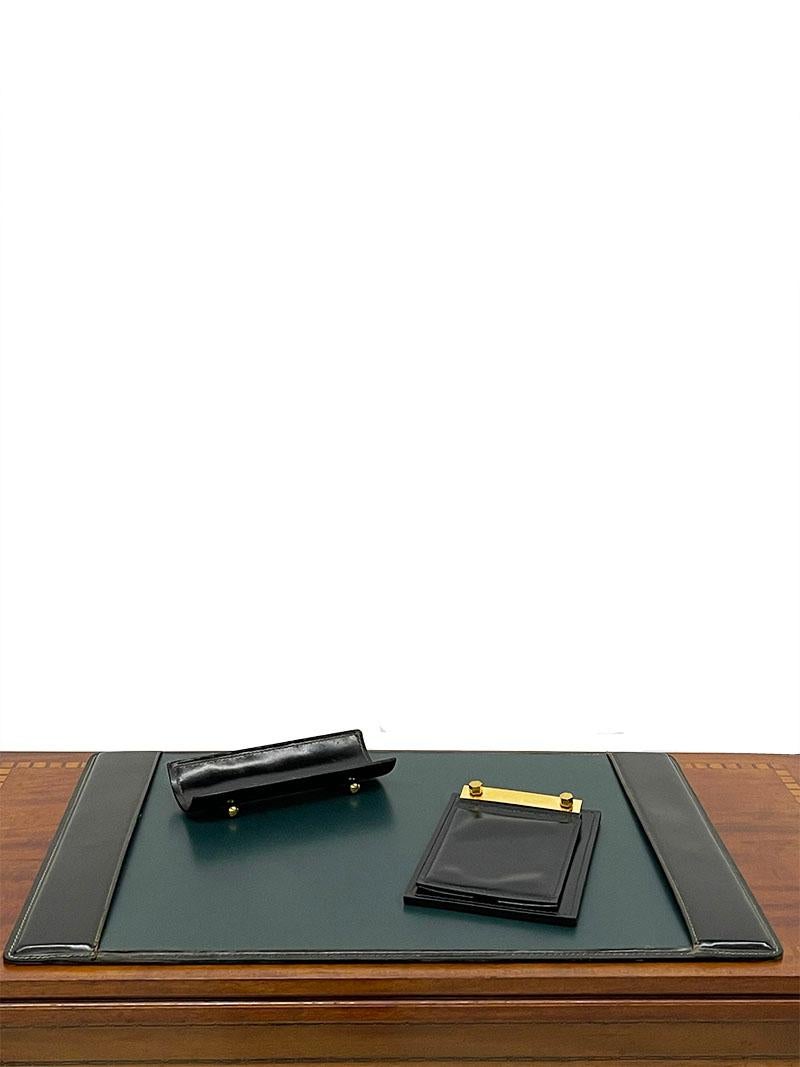 Mid 20th century black leather stitched brass desk set. 

Black leather stitched items, 3 pieces
The leather Notepad has six-sided screws in brass, which is the attachment for a notepad. (not included) 
A photo can be placed under the leather