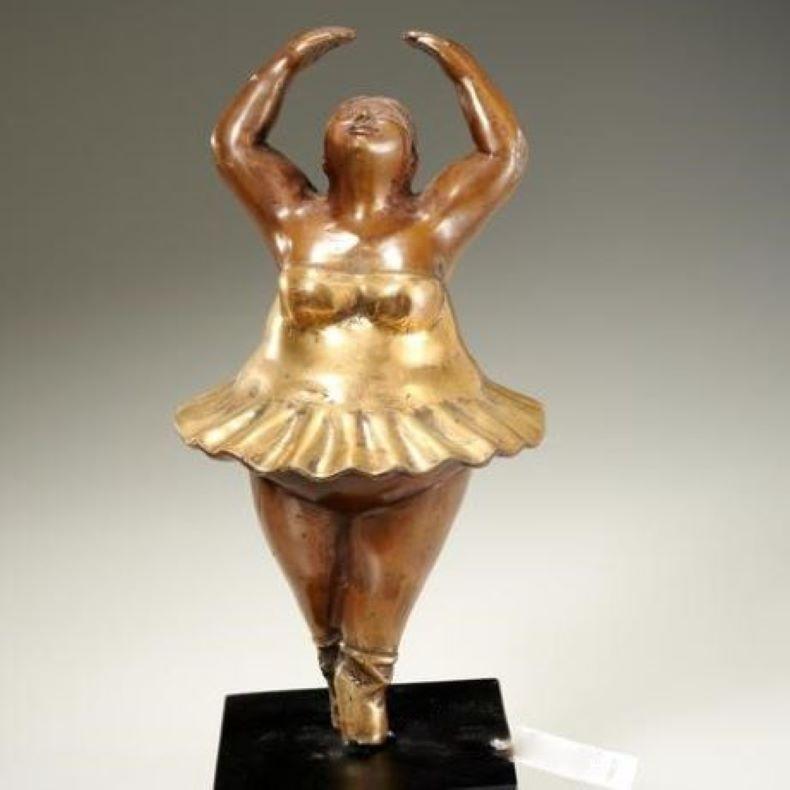 In the style of Fernando Botero Angulo (Colombian, b. 1932). Ballerina Posing, mixed metal sculpture, no visible signature, mounted on ebonized wood plinth. An exuberant study of a ballerina, sure to bring a warm smile to your face. Her generous
