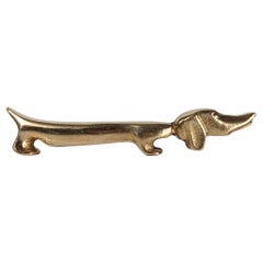 Mid 20th Century Brass Bottle Opener in the shape of a Dachshund Dog, 50s