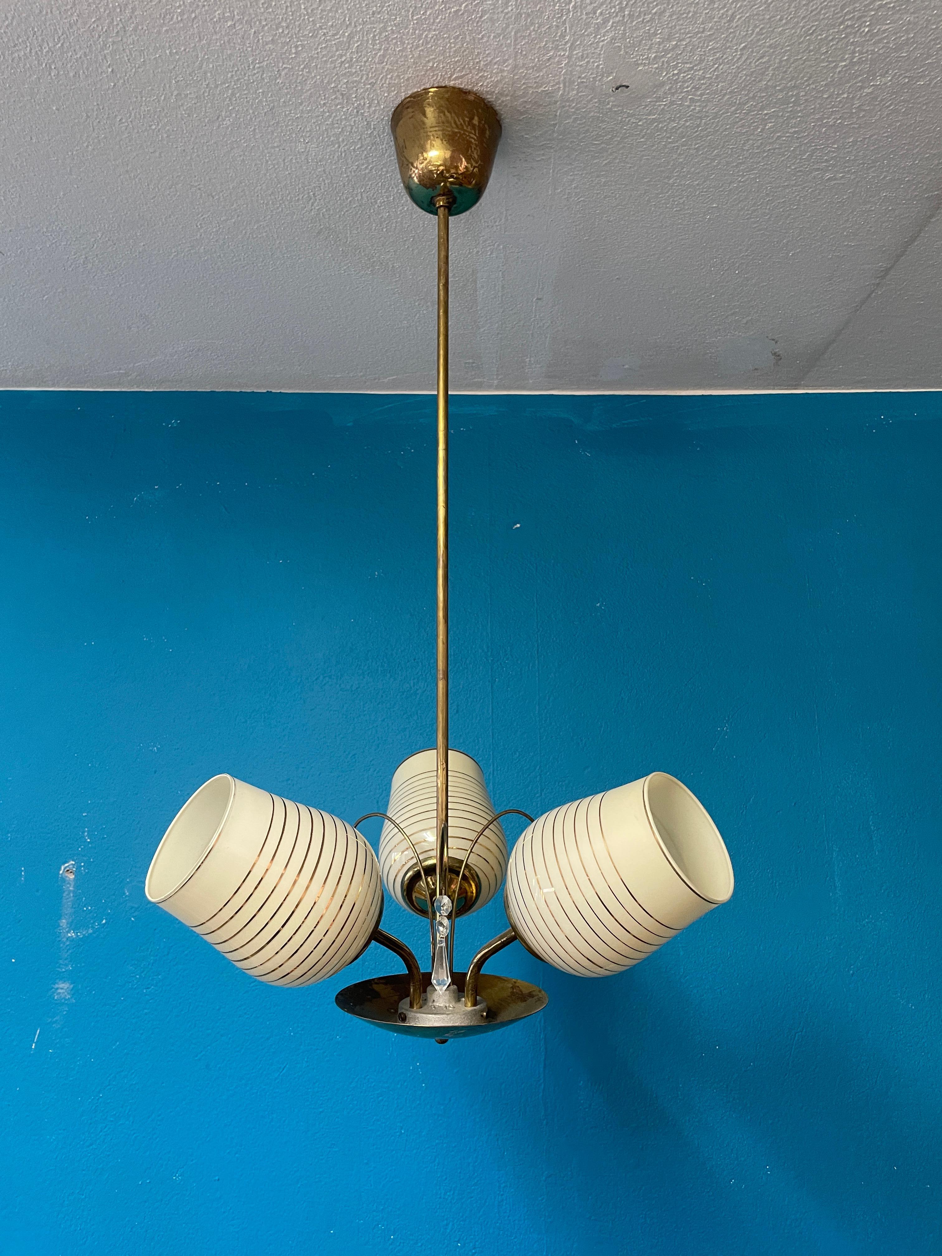Beautiful Tynell Style Chandelier / Pendant from 1950's. 
Manufactured by Korumo Finland. 

Materials:
the Frame are made of brass and shades are blown glass.

- Height 80cm / 25.5in 
- E27 Bulb Bases 
- Wires renewed, works perfectly.



